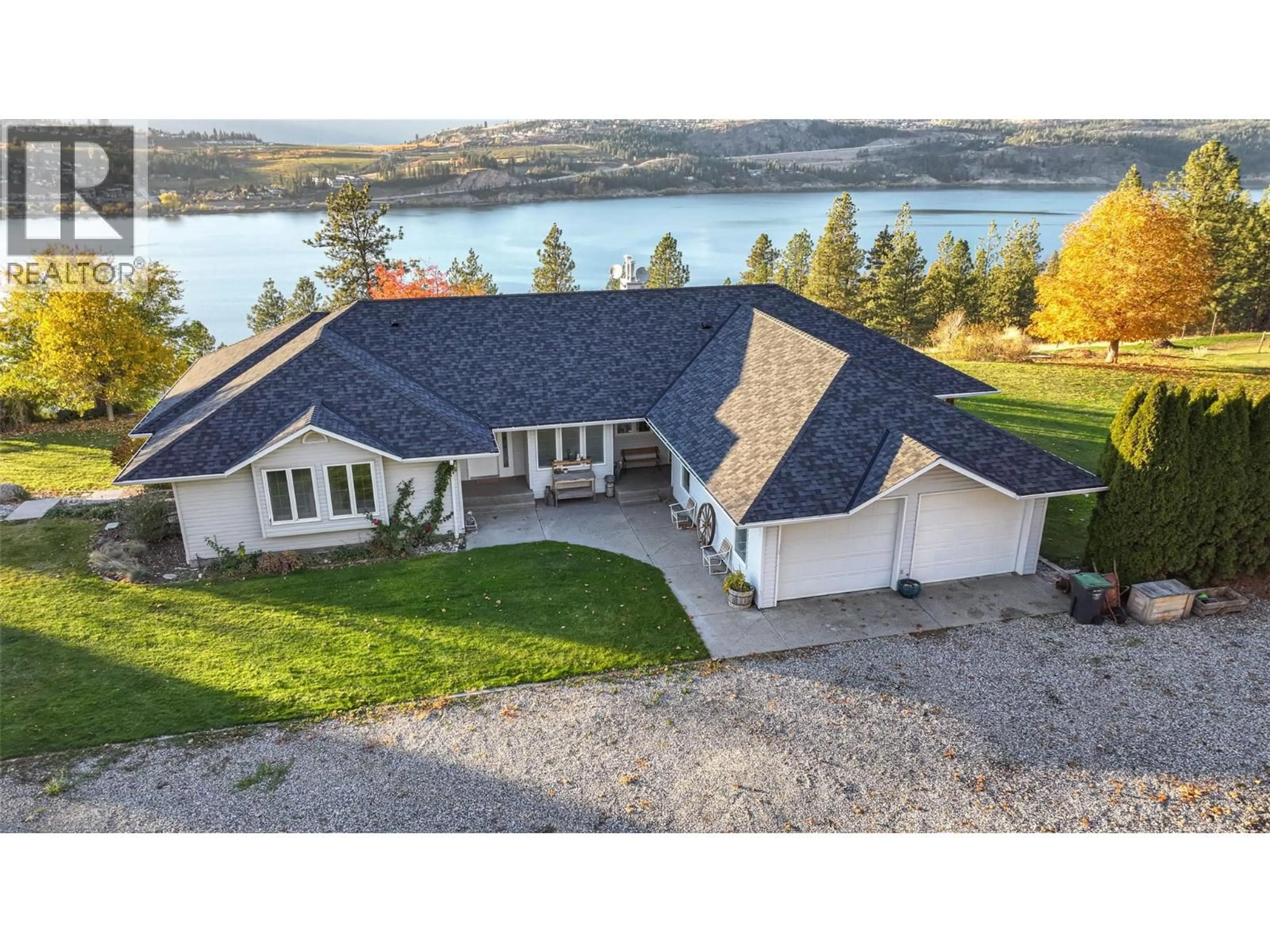 A pic from outside/outdoor area/front of a property/back of a property/a pic from drone, water/lake/river/ocean view for 4491 HEBBERT ROAD, Lake Country British Columbia V4V2A8