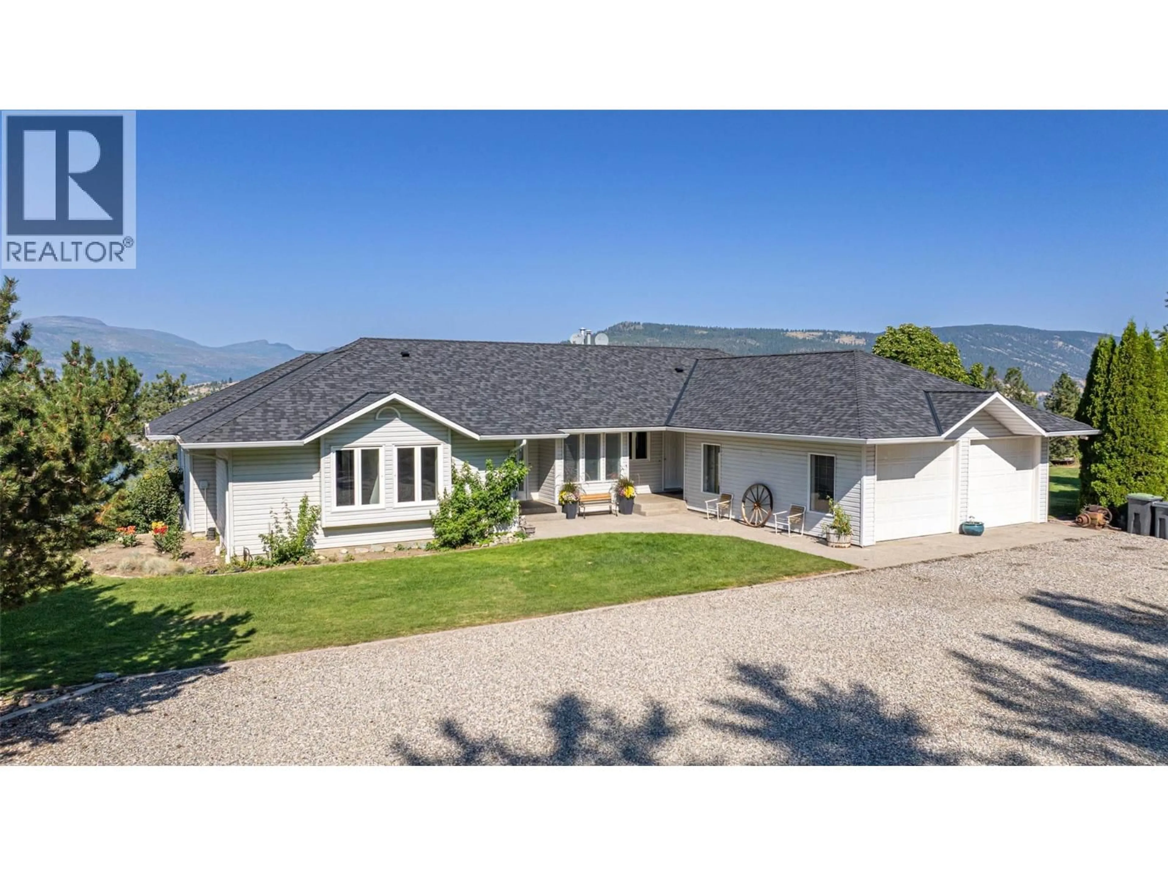 A pic from outside/outdoor area/front of a property/back of a property/a pic from drone, mountain view for 4491 HEBBERT ROAD, Lake Country British Columbia V4V2A8