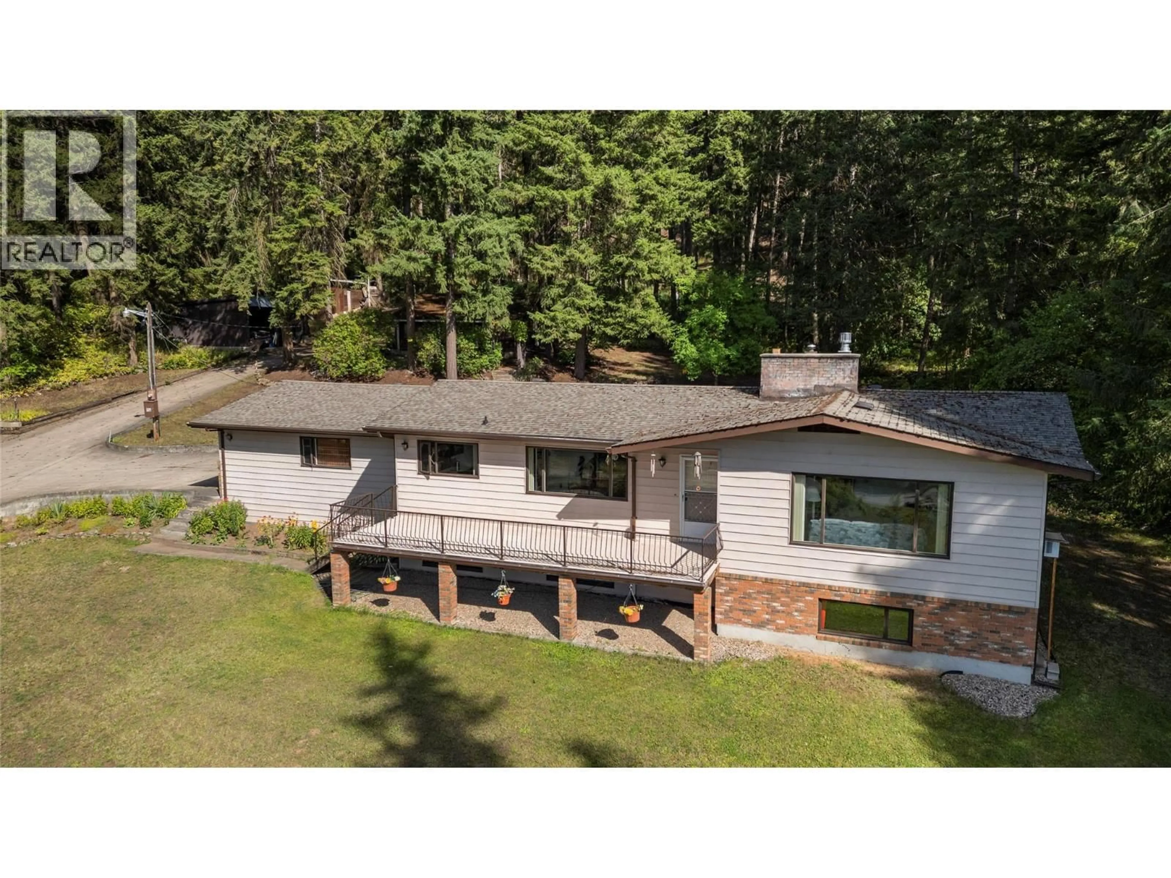 A pic from outside/outdoor area/front of a property/back of a property/a pic from drone, water/lake/river/ocean view for 1476 VELLA ROAD, Tappen British Columbia V0E2X2