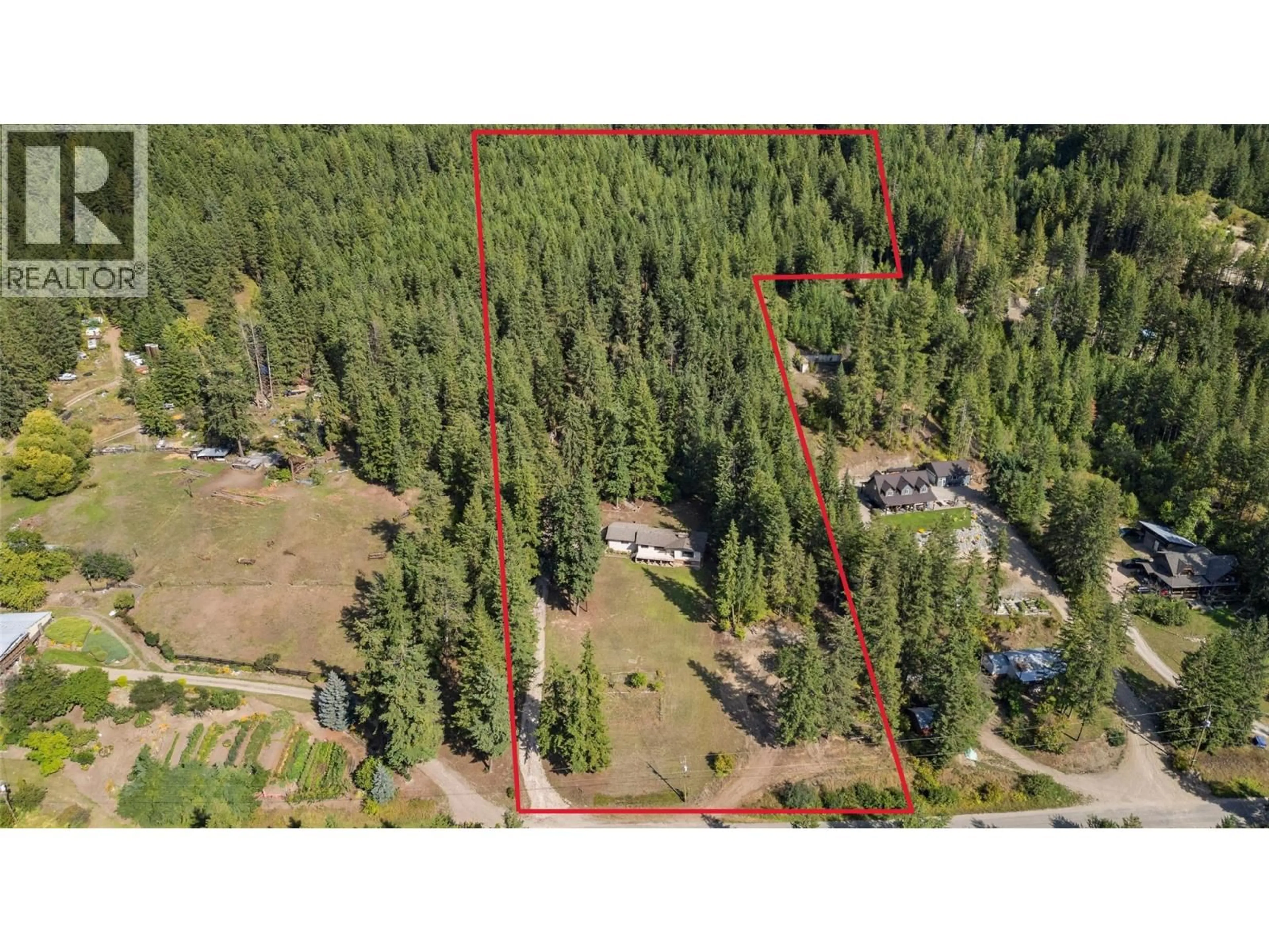 A pic from outside/outdoor area/front of a property/back of a property/a pic from drone, forest/trees view for 1476 VELLA ROAD, Tappen British Columbia V0E2X2