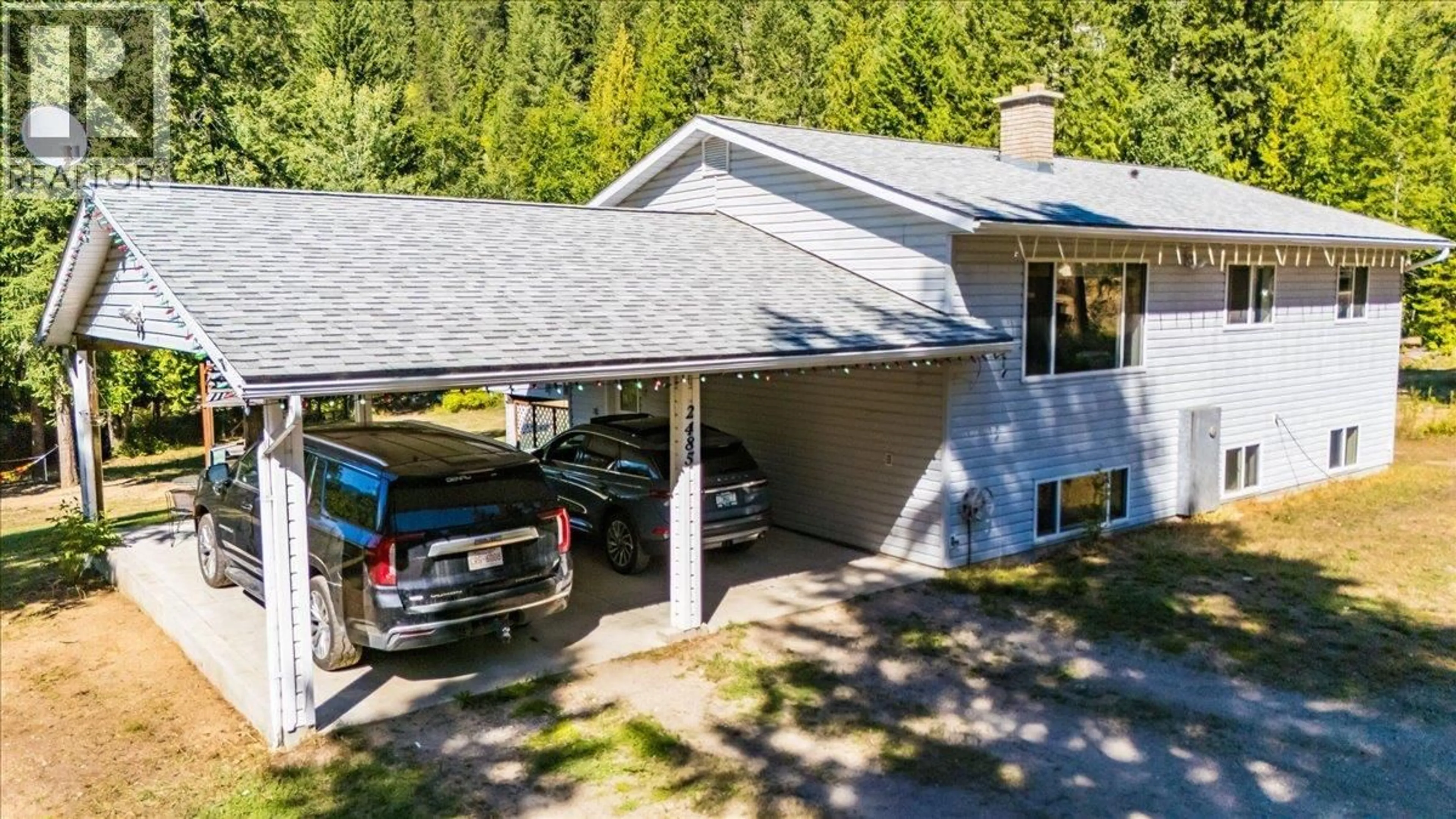 A pic from outside/outdoor area/front of a property/back of a property/a pic from drone, street for 2485 UPPER GIBSON ROAD, Castlegar British Columbia V1N4S7