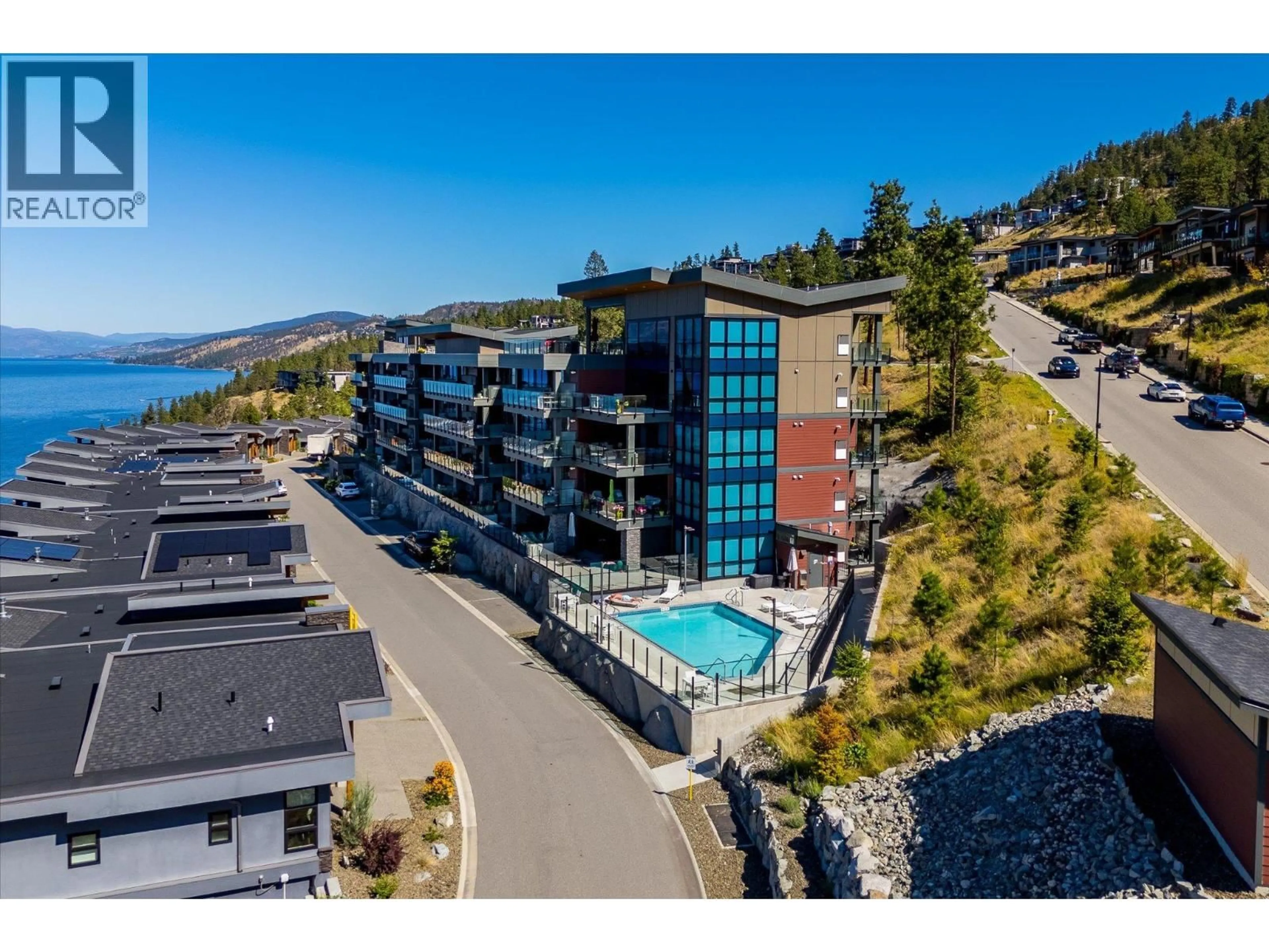A pic from outside/outdoor area/front of a property/back of a property/a pic from drone, water/lake/river/ocean view for 311 - 3475 GRANITE CLOSE, Kelowna British Columbia V1V0B9