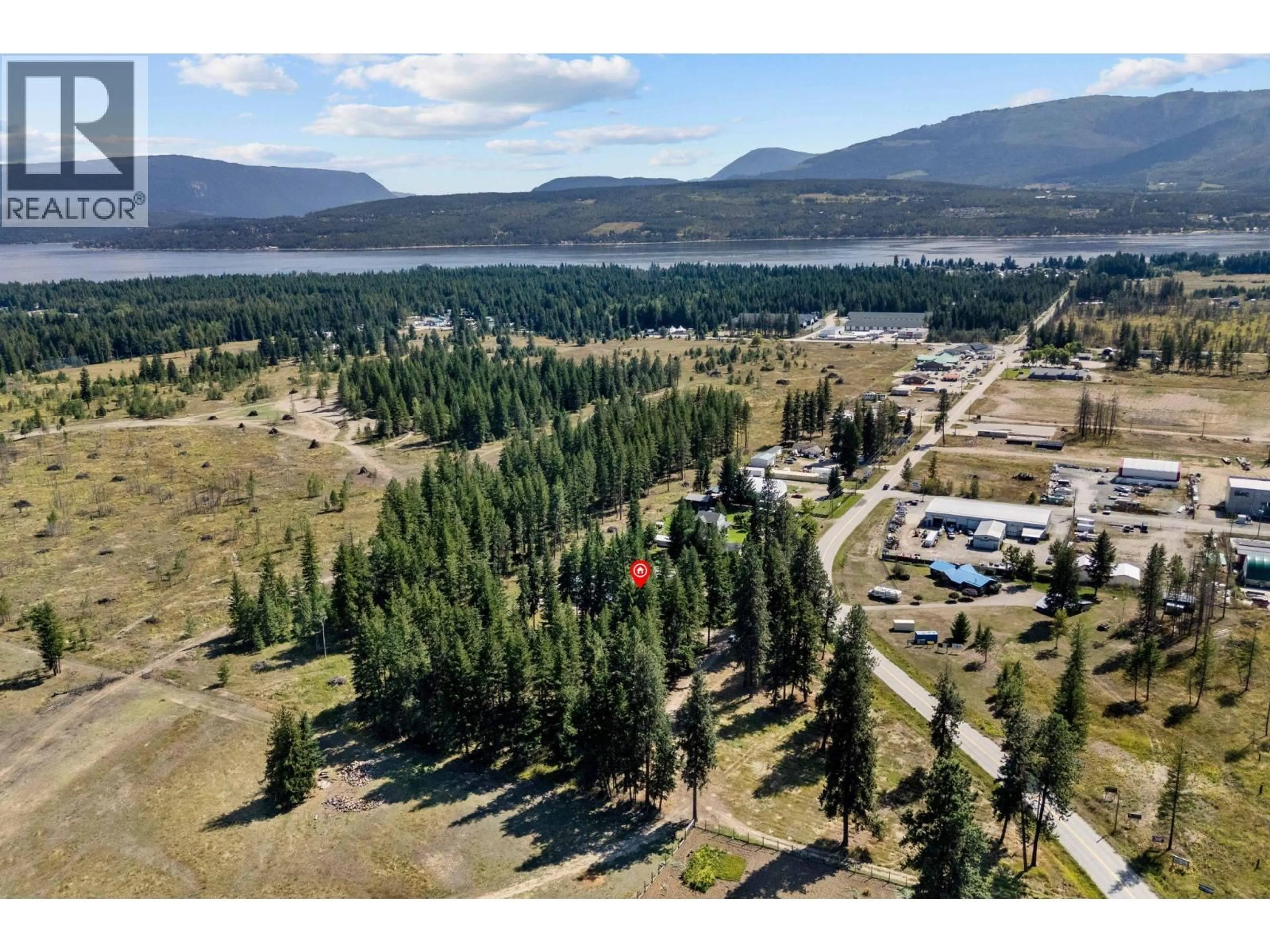 A pic from outside/outdoor area/front of a property/back of a property/a pic from drone, mountain view for 1434 BEATTY ROAD, Scotch Creek British Columbia V0E1M5