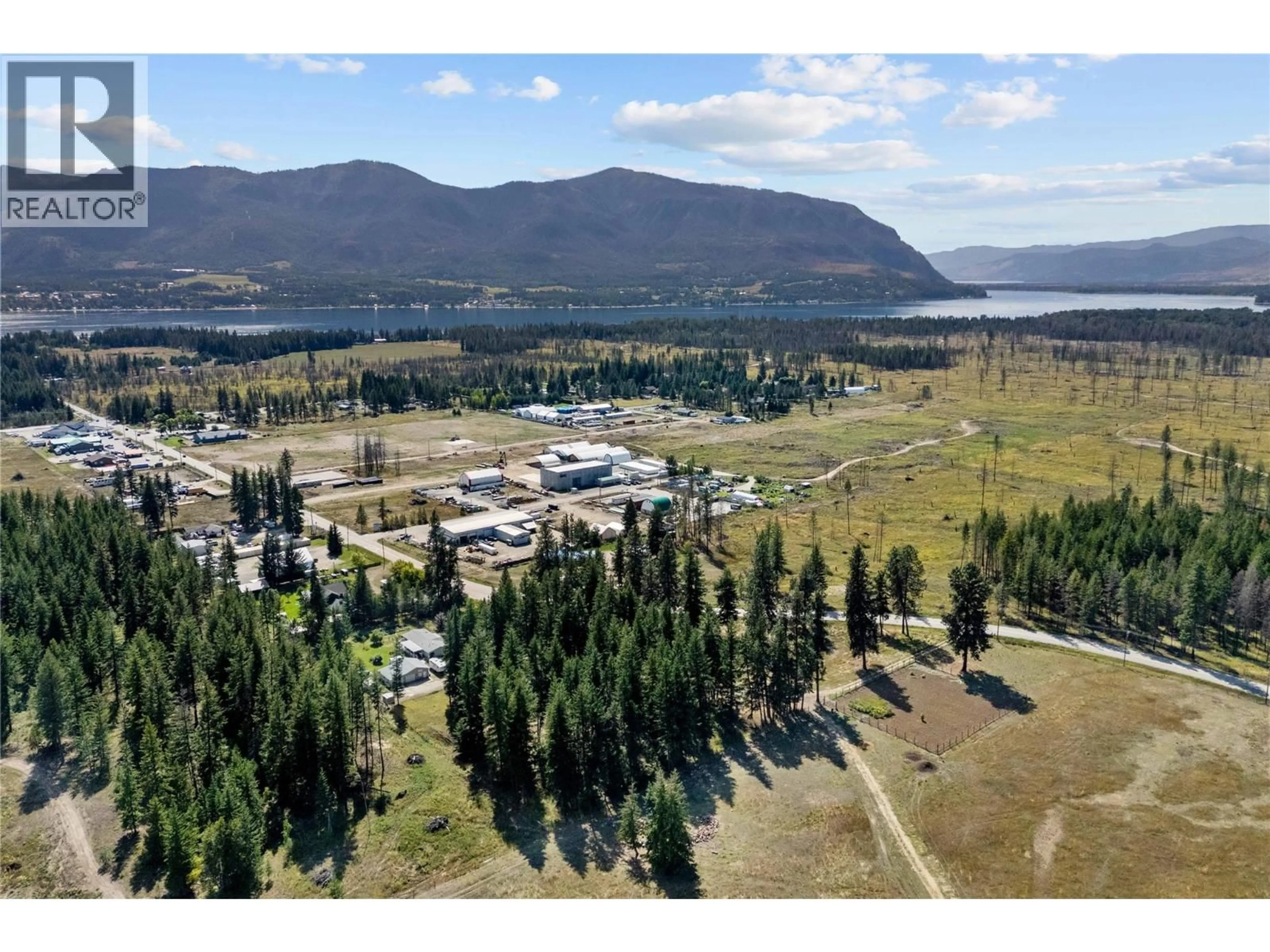 A pic from outside/outdoor area/front of a property/back of a property/a pic from drone, mountain view for 1434 BEATTY ROAD, Scotch Creek British Columbia V0E1M5