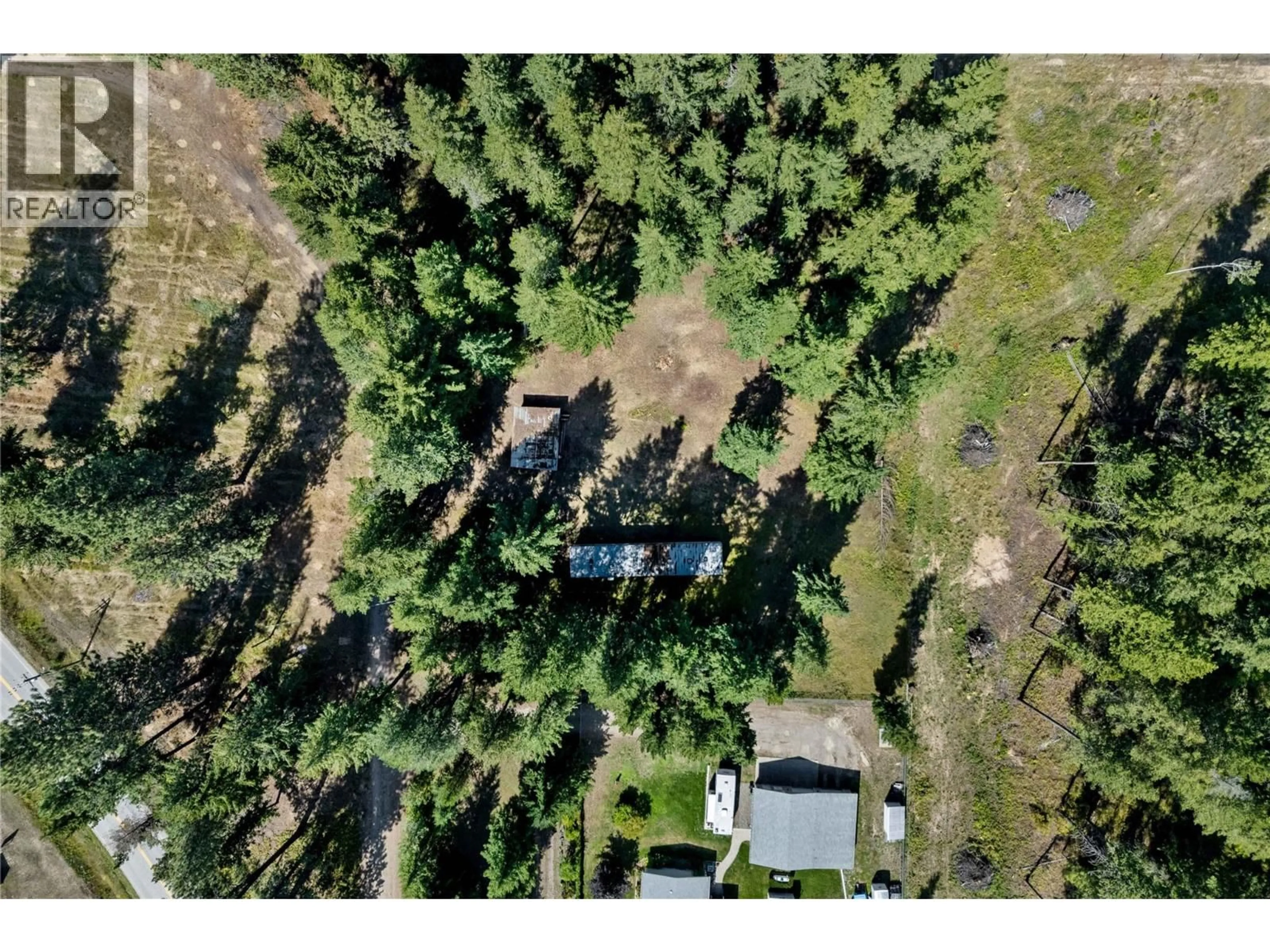 A pic from outside/outdoor area/front of a property/back of a property/a pic from drone, forest/trees view for 1434 BEATTY ROAD, Scotch Creek British Columbia V0E1M5