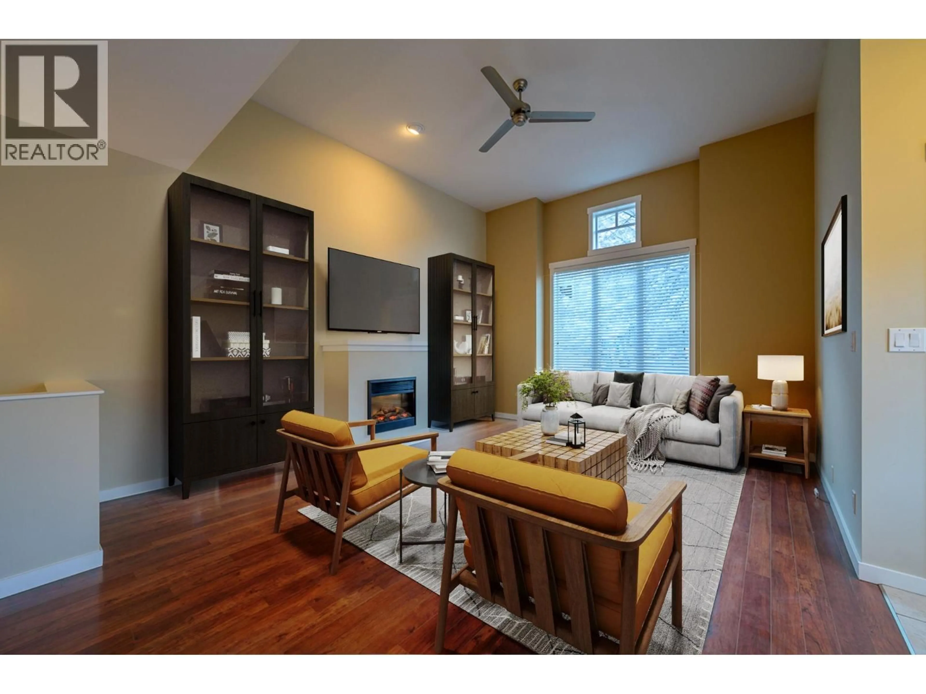 Living room with furniture, wood/laminate floor for 155 - 2920 VALLEYVIEW DRIVE, Kamloops British Columbia V2C0A8