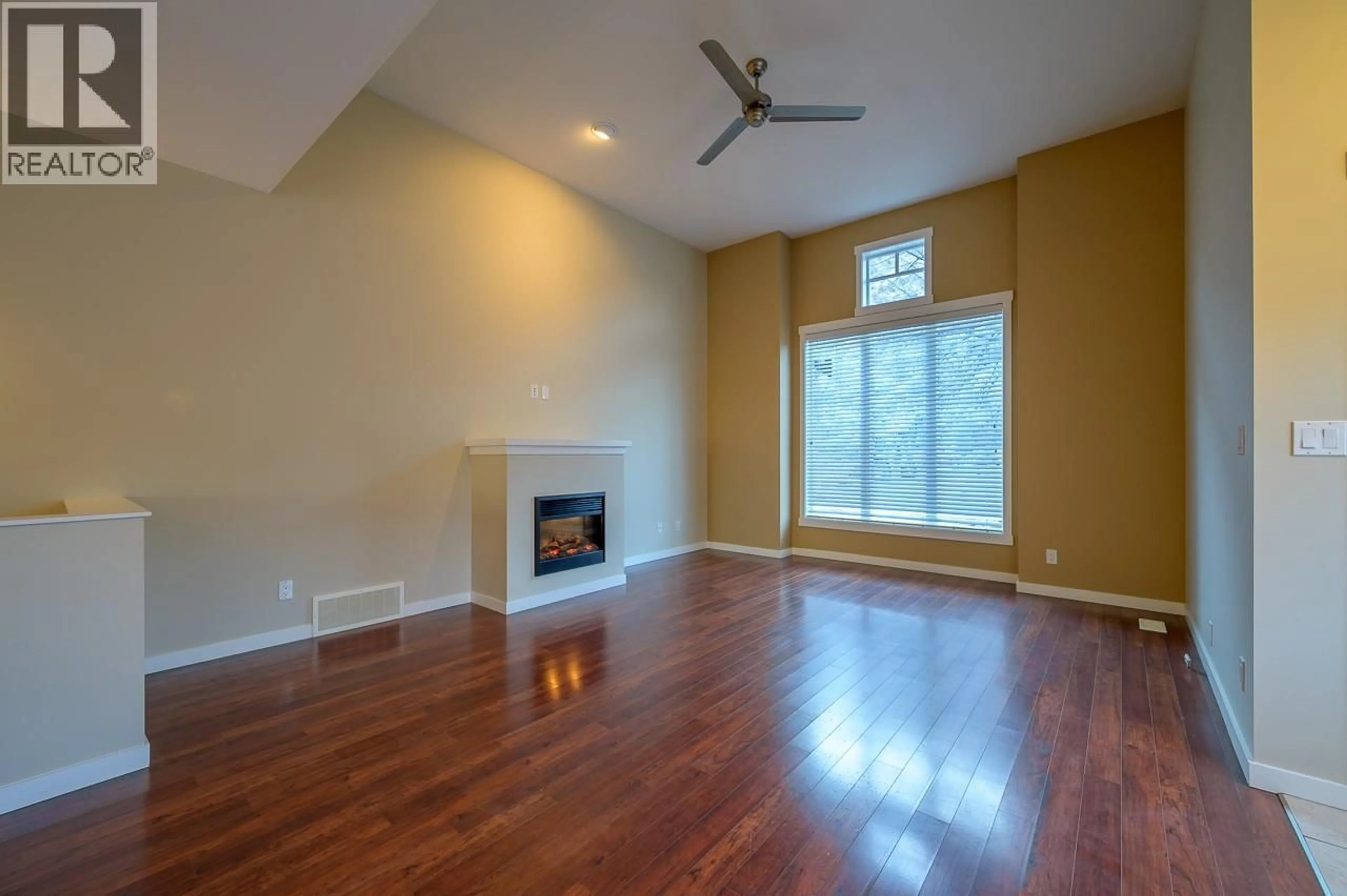 Living room with furniture, wood/laminate floor for 155 - 2920 VALLEYVIEW DRIVE, Kamloops British Columbia V2C0A8