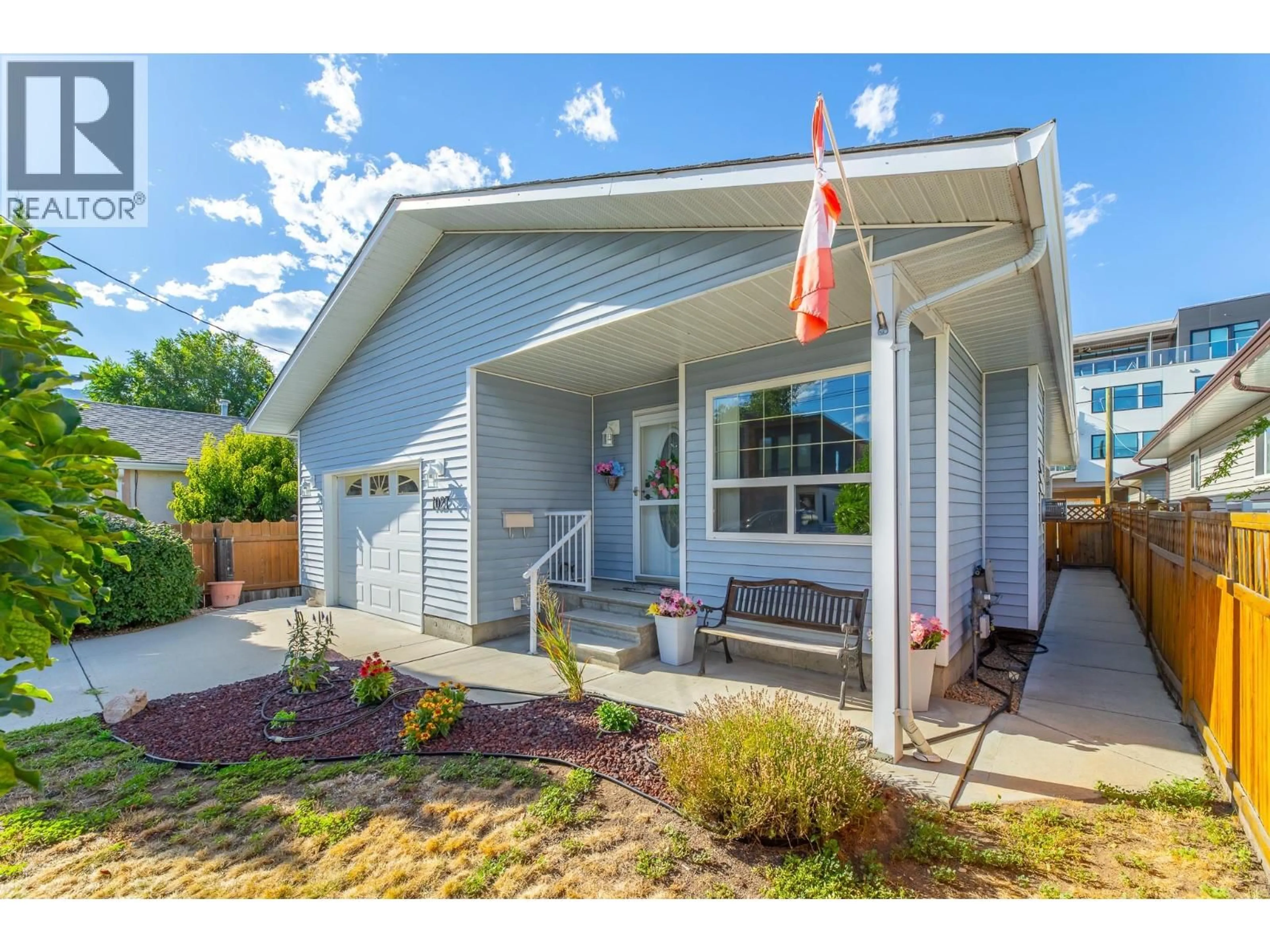 Home with vinyl exterior material, street for 1027 DYNES AVENUE, Penticton British Columbia V2A1E9