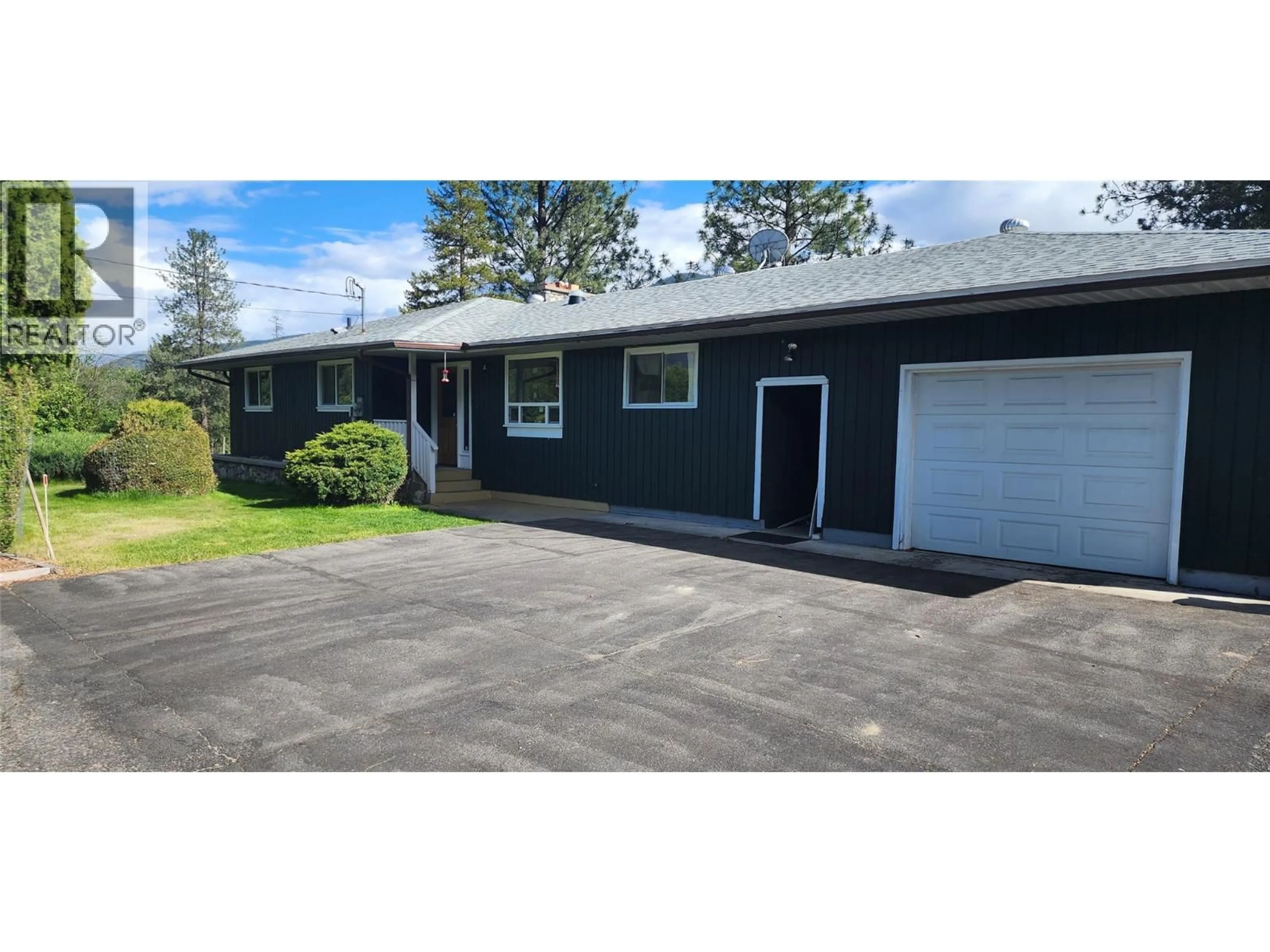 A pic from outside/outdoor area/front of a property/back of a property/a pic from drone, street for 3250 HALL FRONTAGE ROAD, Grand Forks British Columbia V0H1H5