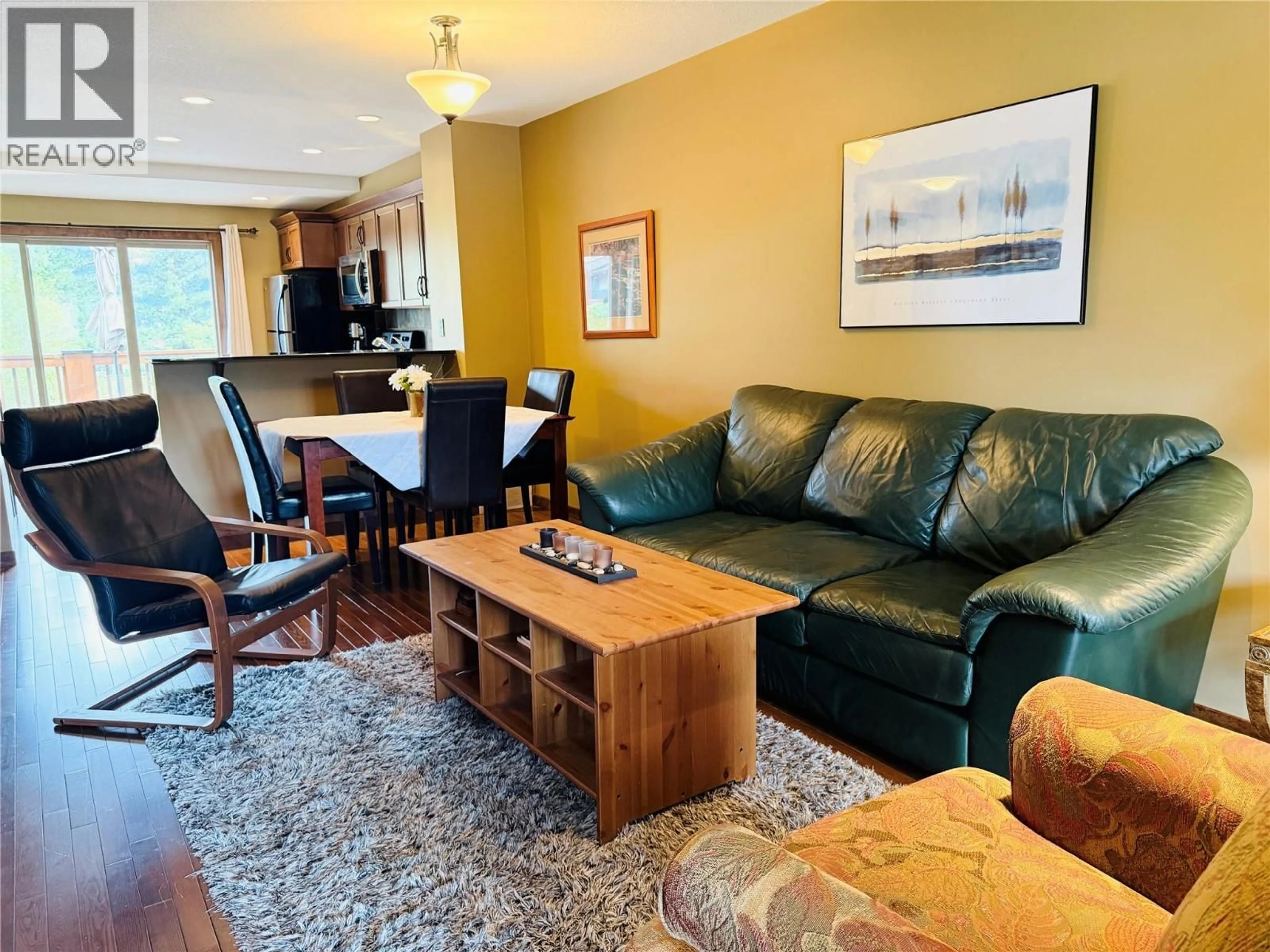 Living room with furniture, wood/laminate floor for 18 - 1000 12TH STREET, Invermere British Columbia V0A1K0