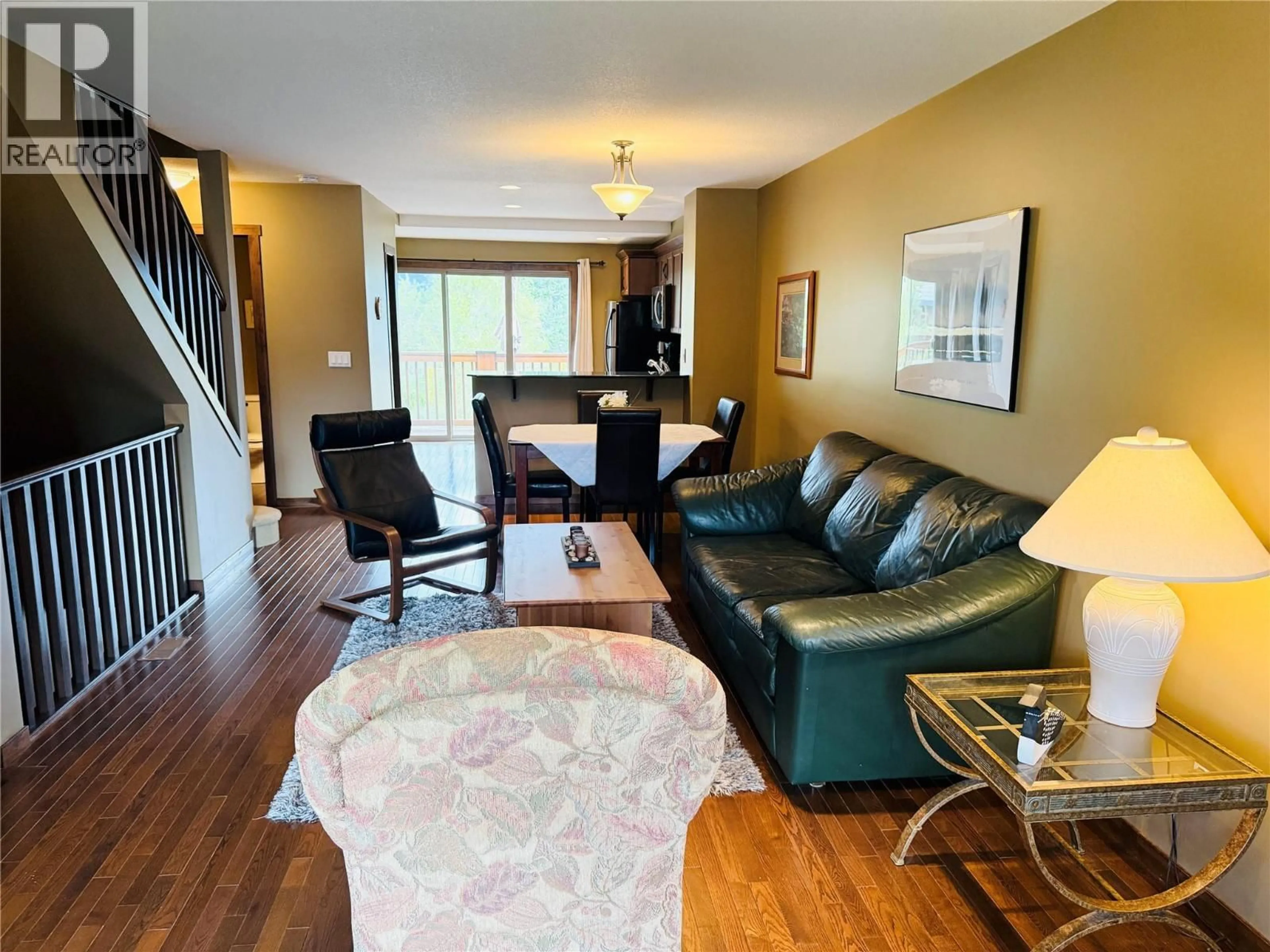 Living room with furniture, wood/laminate floor for 18 - 1000 12TH STREET, Invermere British Columbia V0A1K0