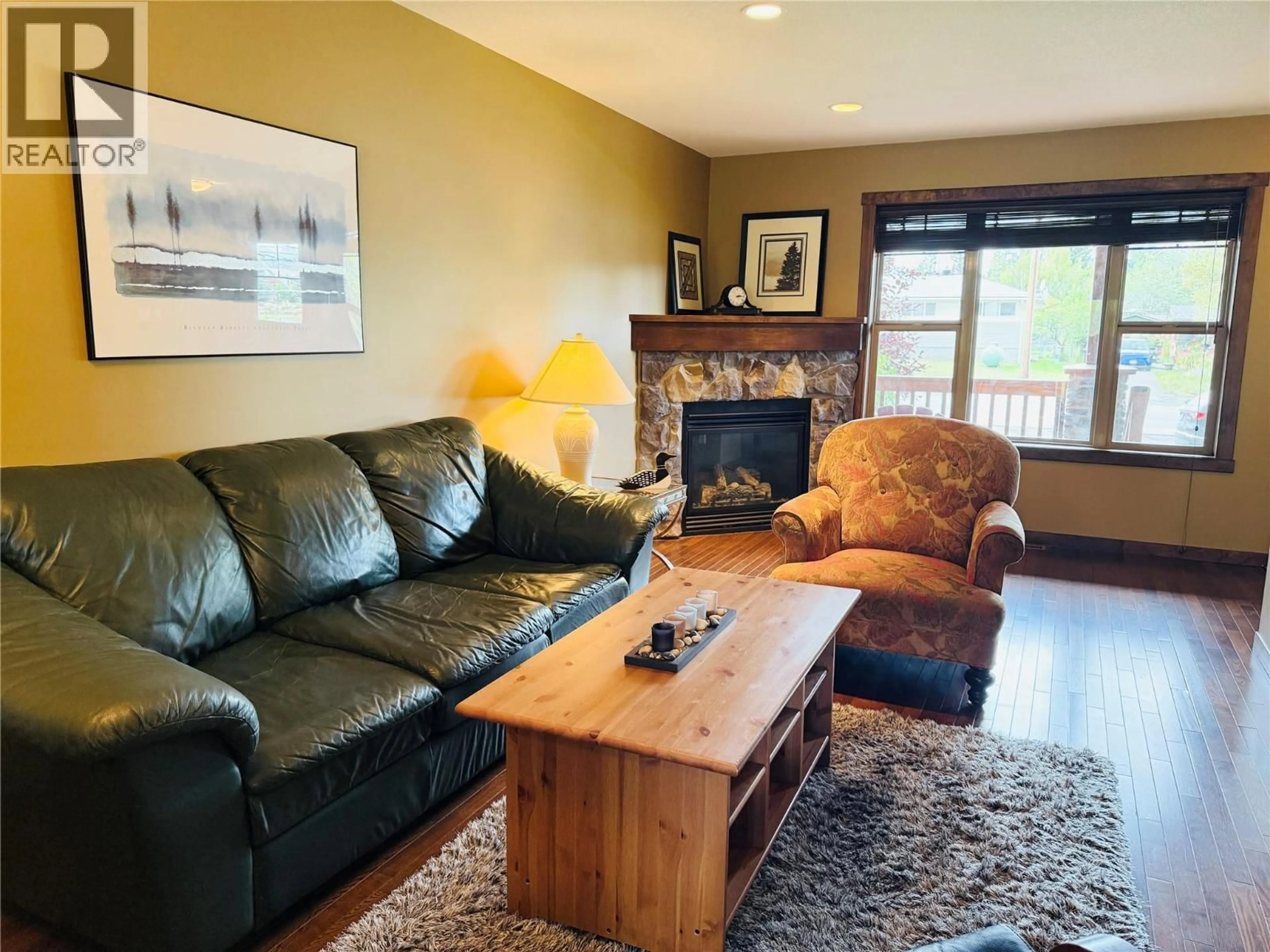 Living room with furniture, wood/laminate floor for 18 - 1000 12TH STREET, Invermere British Columbia V0A1K0