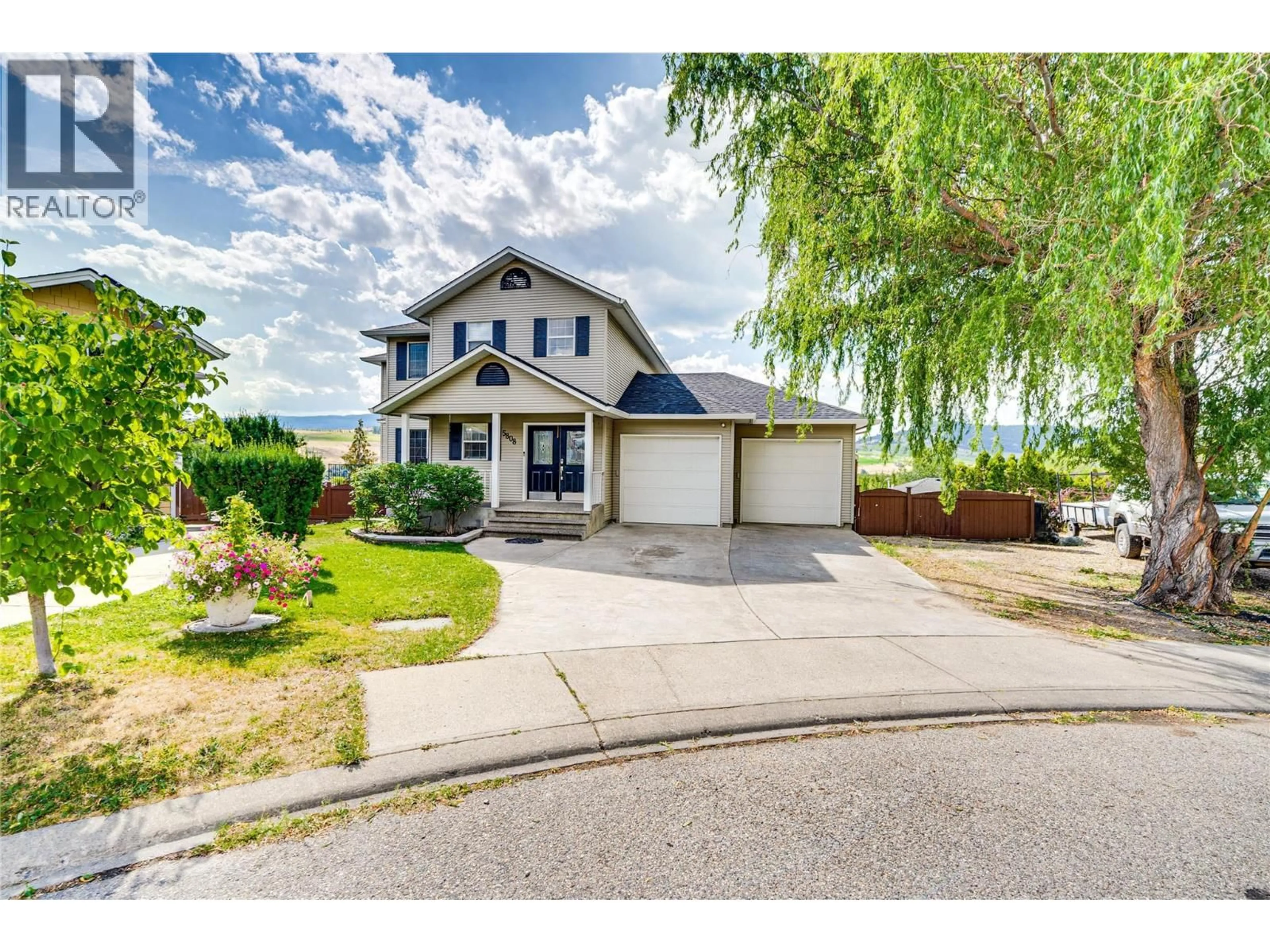 Home with vinyl exterior material, street for 5808 RICHFIELD PLACE, Vernon British Columbia V1H1A6