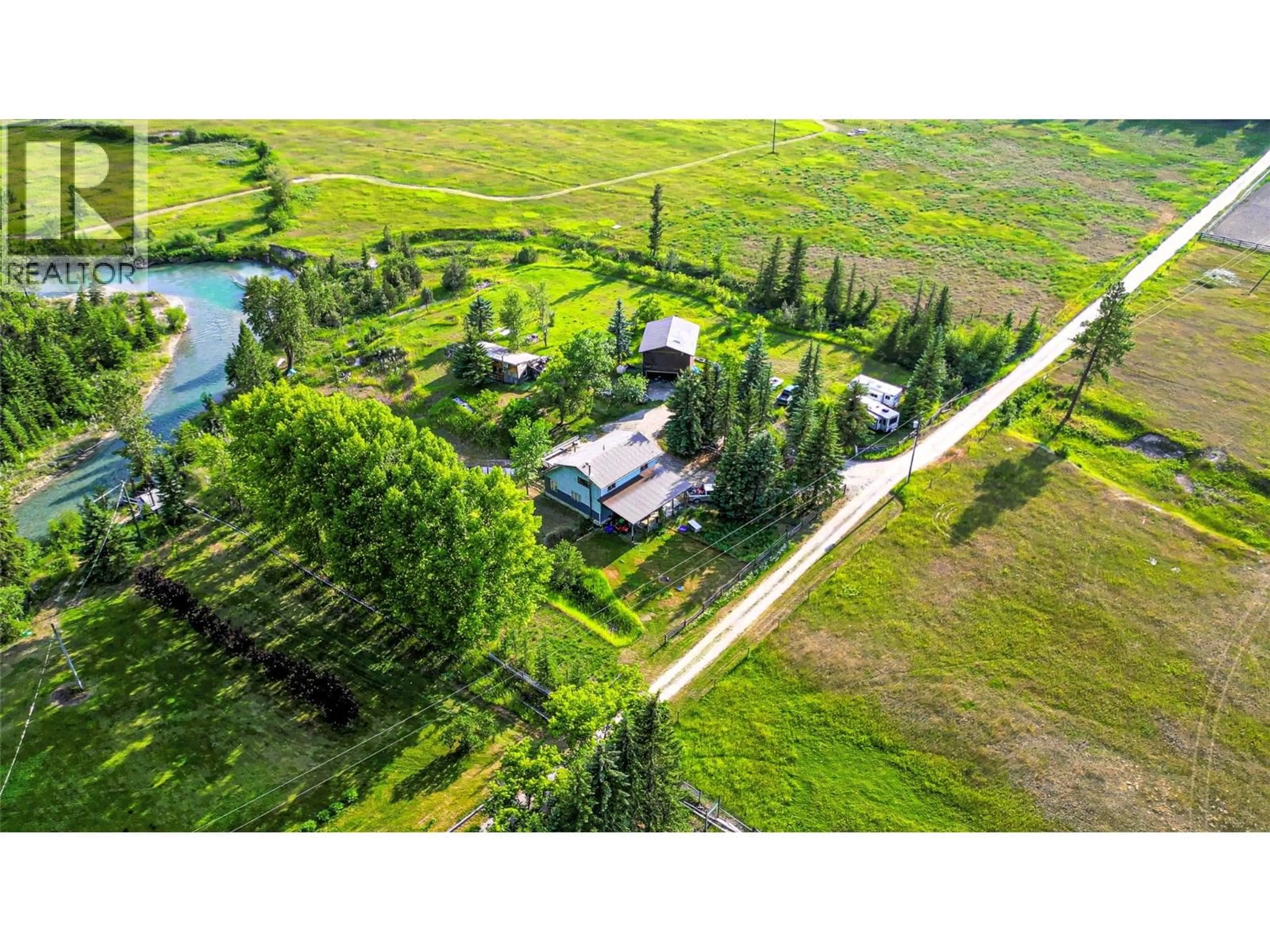 A pic from outside/outdoor area/front of a property/back of a property/a pic from drone, water/lake/river/ocean view for 3560 ISLAND POND ROAD, Skookumchuck British Columbia V0B2E0