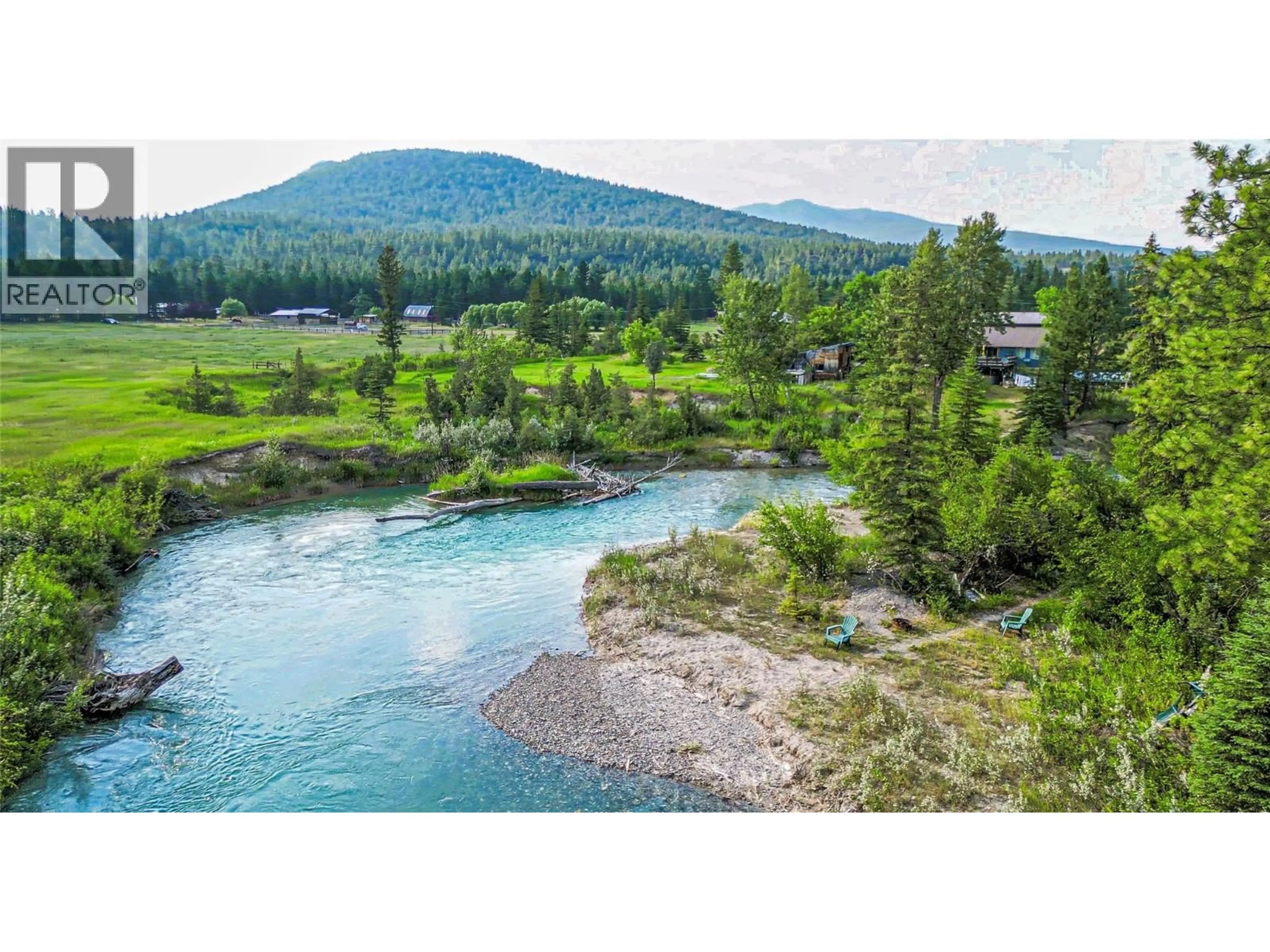 A pic from outside/outdoor area/front of a property/back of a property/a pic from drone, water/lake/river/ocean view for 3560 ISLAND POND ROAD, Skookumchuck British Columbia V0B2E0