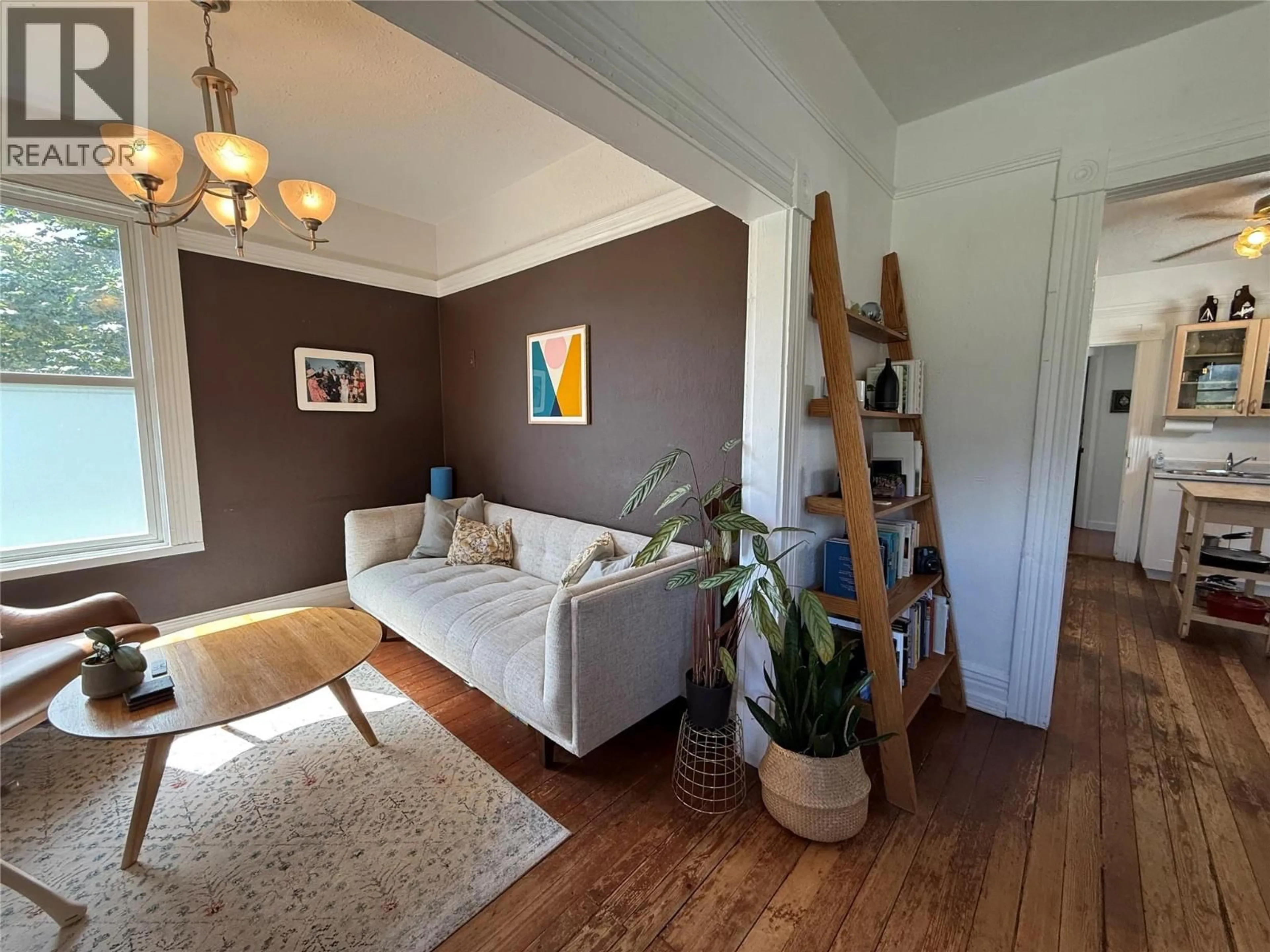 Living room with furniture, wood/laminate floor for 415 DOWNIE STREET, Revelstoke British Columbia V0E2S0