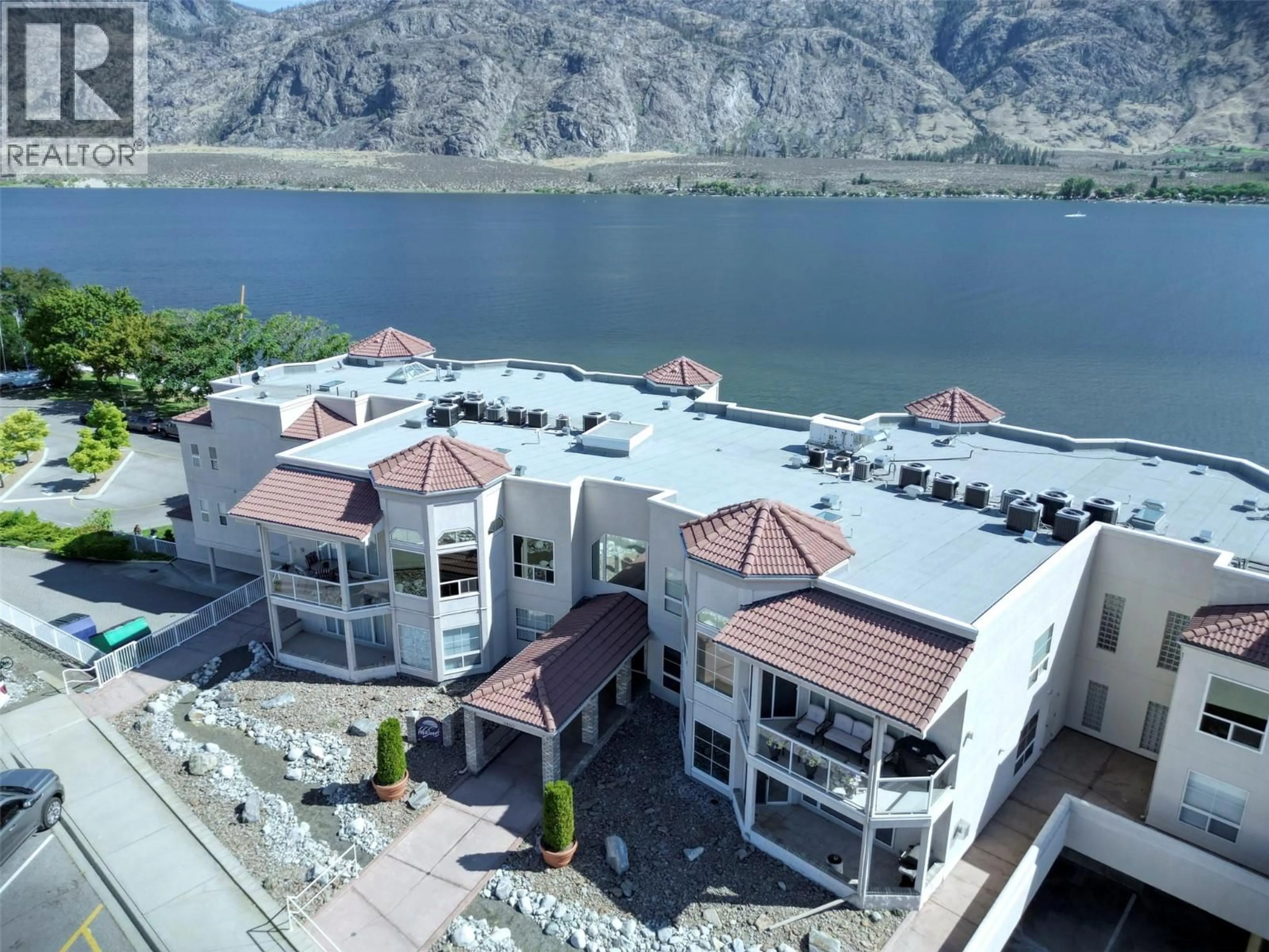 A pic from outside/outdoor area/front of a property/back of a property/a pic from drone, mountain view for 202 - 7805 SPARTAN DRIVE, Osoyoos British Columbia V0H1V7