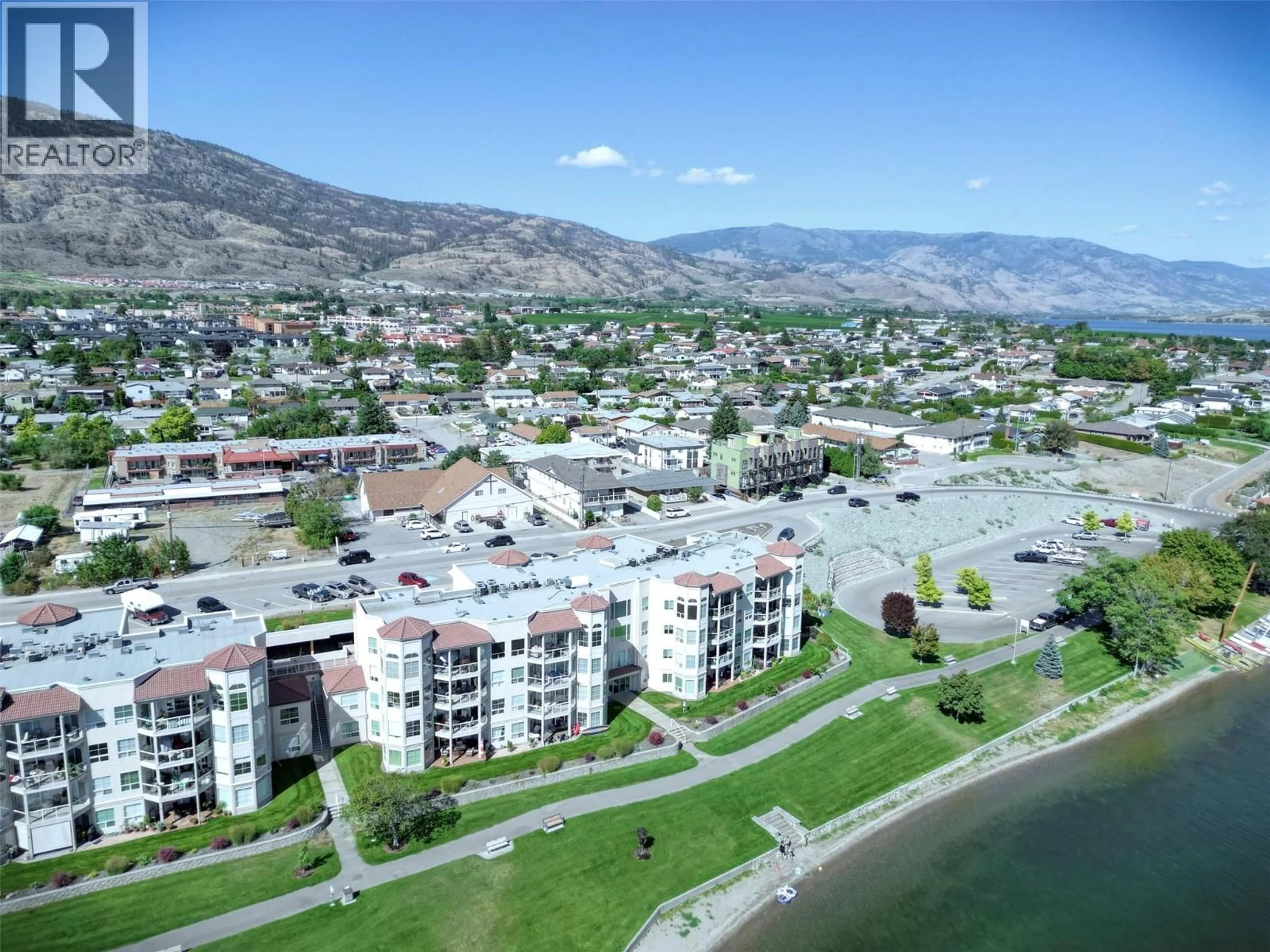 A pic from outside/outdoor area/front of a property/back of a property/a pic from drone, water/lake/river/ocean view for 202 - 7805 SPARTAN DRIVE, Osoyoos British Columbia V0H1V7