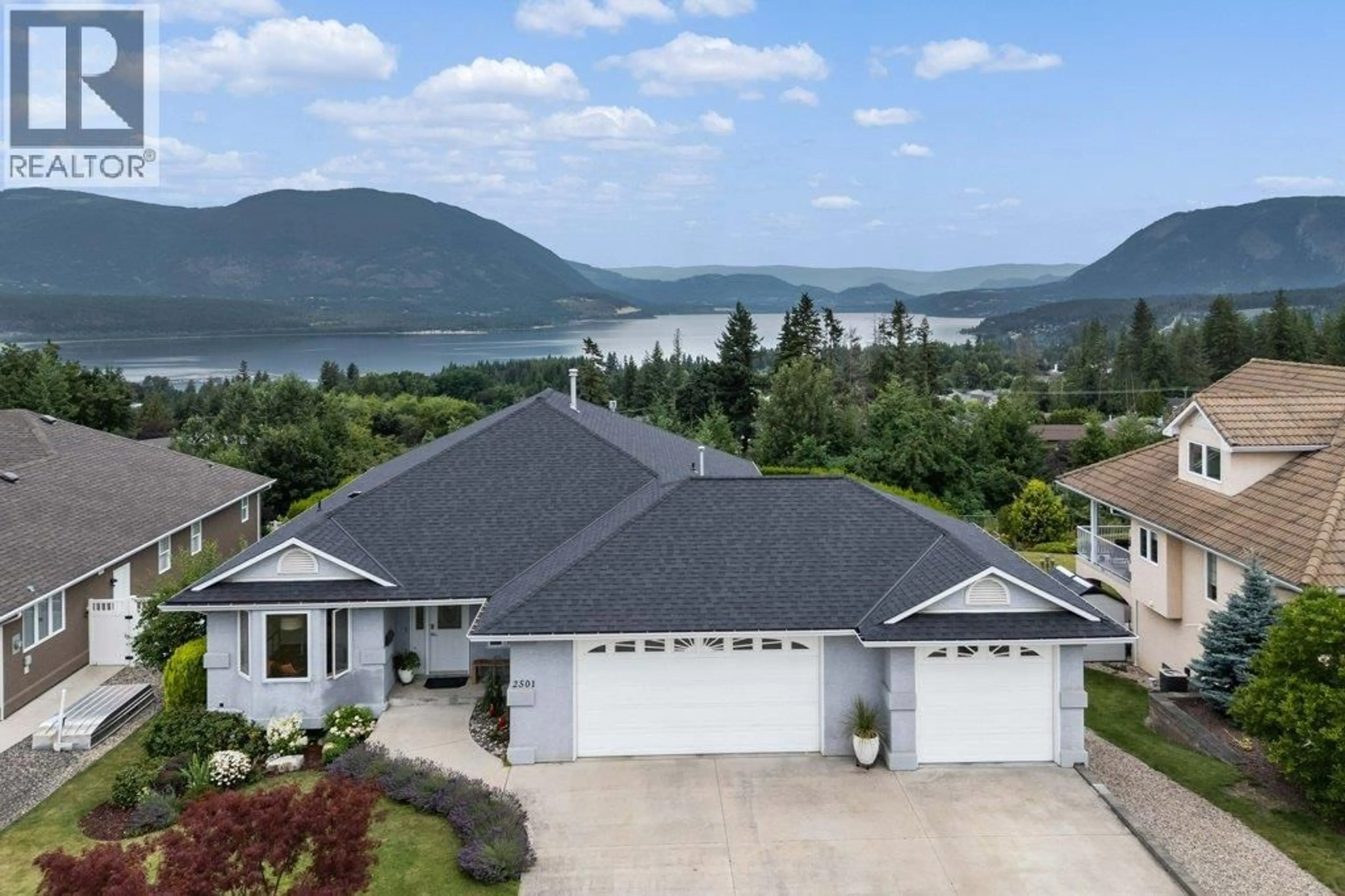 A pic from outside/outdoor area/front of a property/back of a property/a pic from drone, water/lake/river/ocean view for 2501 4 AVENUE SOUTHEAST, Salmon Arm British Columbia V1E1K7