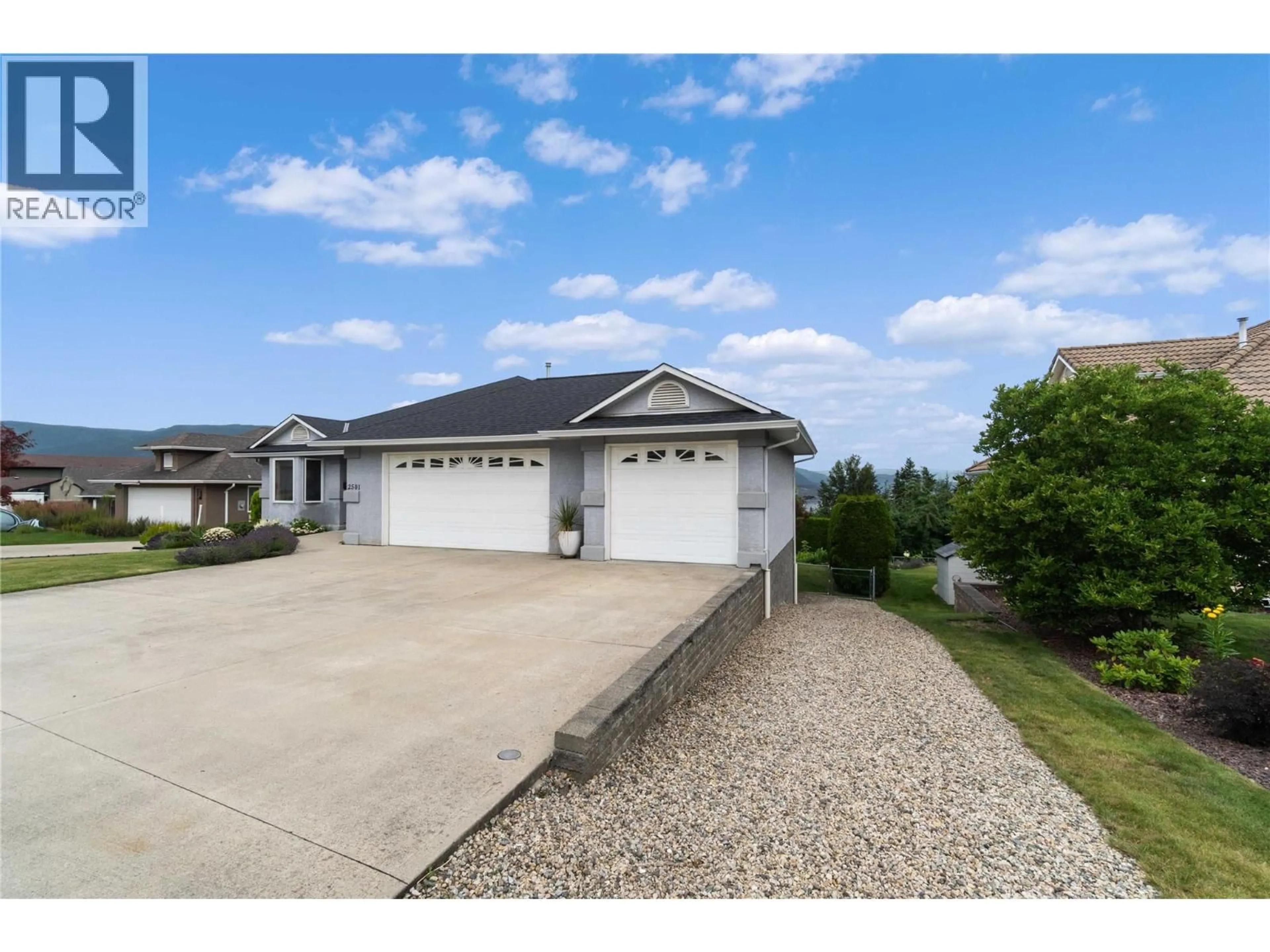 A pic from outside/outdoor area/front of a property/back of a property/a pic from drone, water/lake/river/ocean view for 2501 4 AVENUE SOUTHEAST, Salmon Arm British Columbia V1E1K7