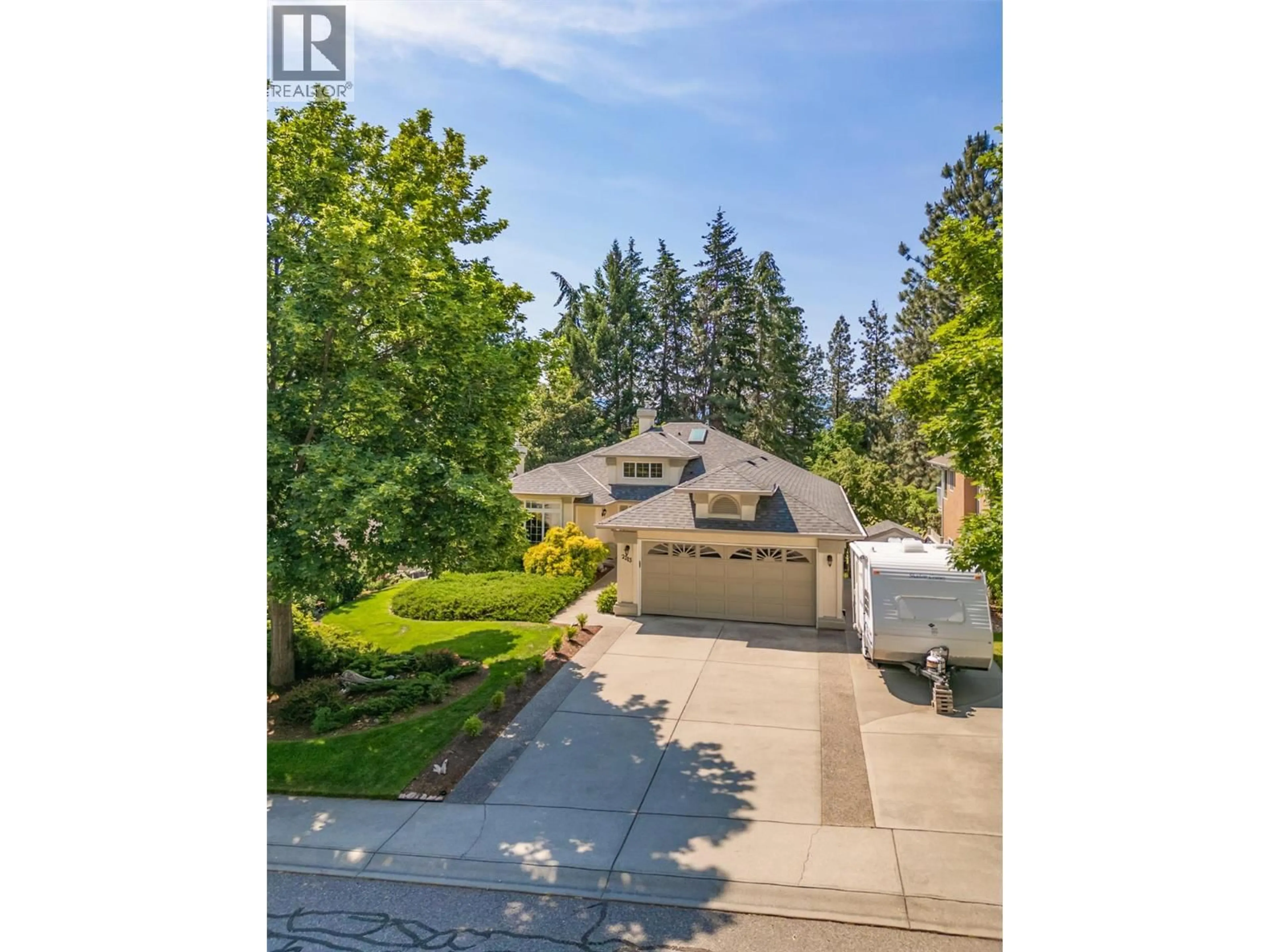 A pic from outside/outdoor area/front of a property/back of a property/a pic from drone, street for 2213 SHANNON WOODS PLACE, West Kelowna British Columbia V4T2L9
