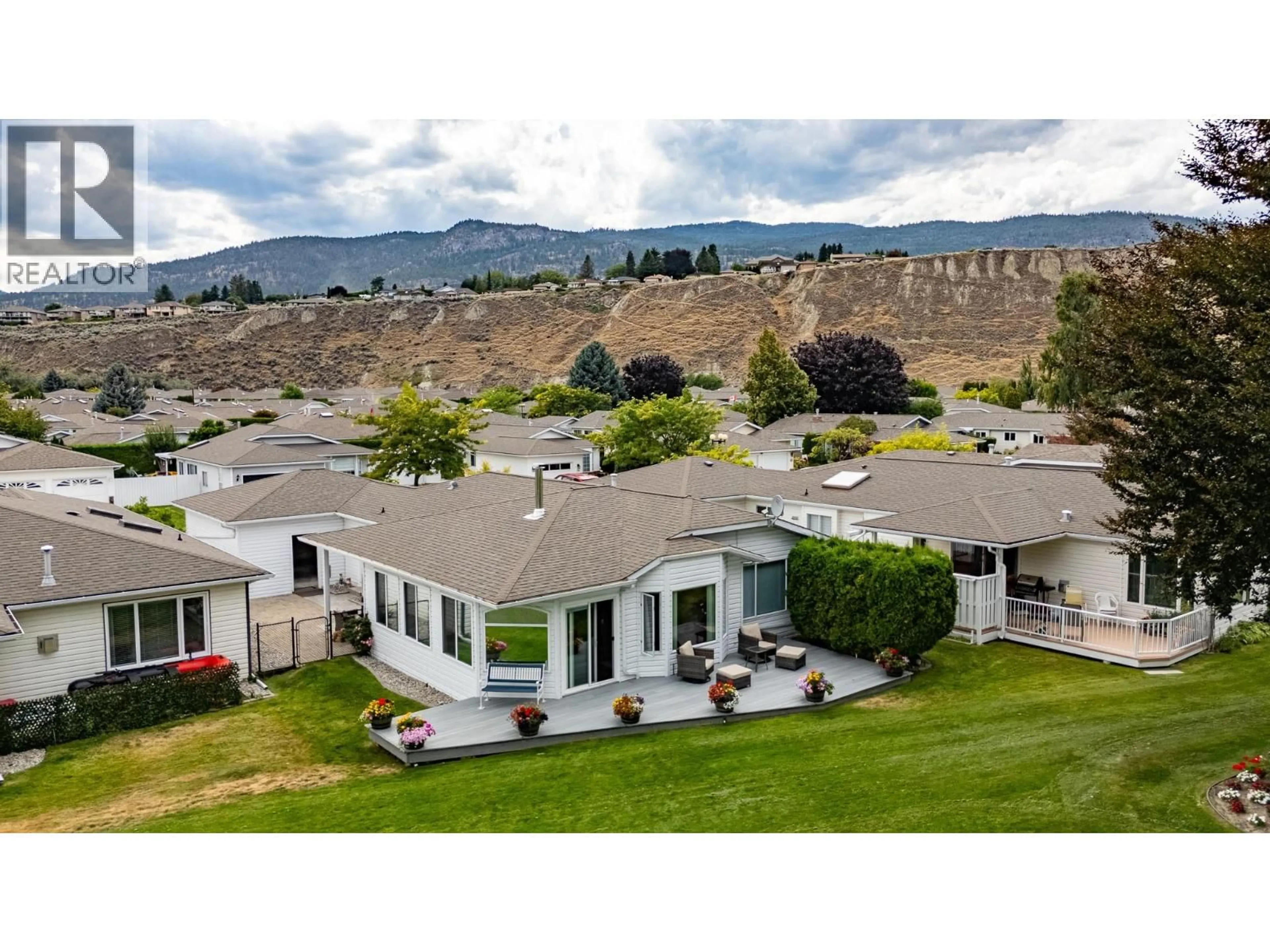 A pic from outside/outdoor area/front of a property/back of a property/a pic from drone, mountain view for 57 KINGFISHER DRIVE, Penticton British Columbia V2A8K6
