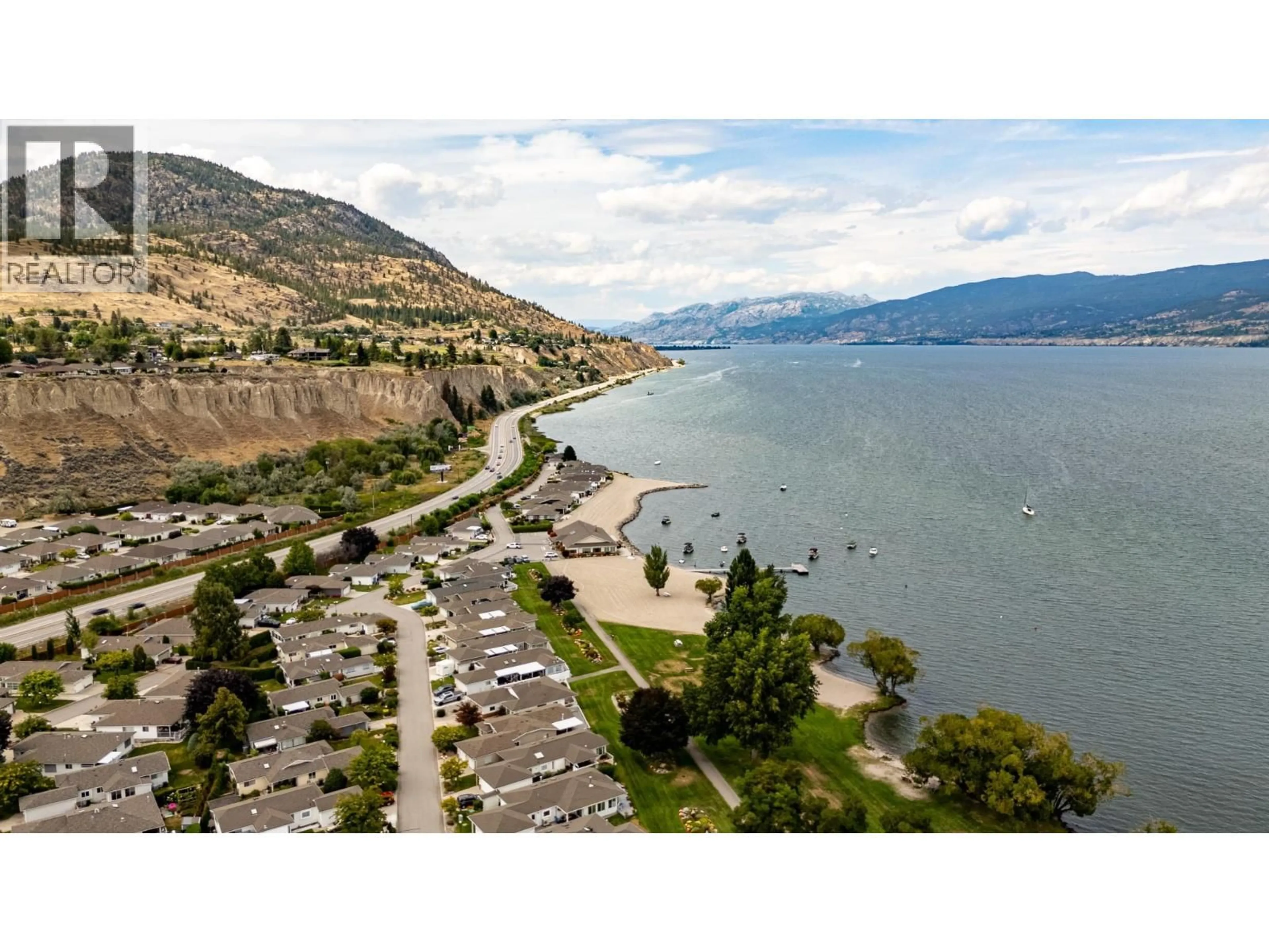 A pic from outside/outdoor area/front of a property/back of a property/a pic from drone, water/lake/river/ocean view for 57 KINGFISHER DRIVE, Penticton British Columbia V2A8K6