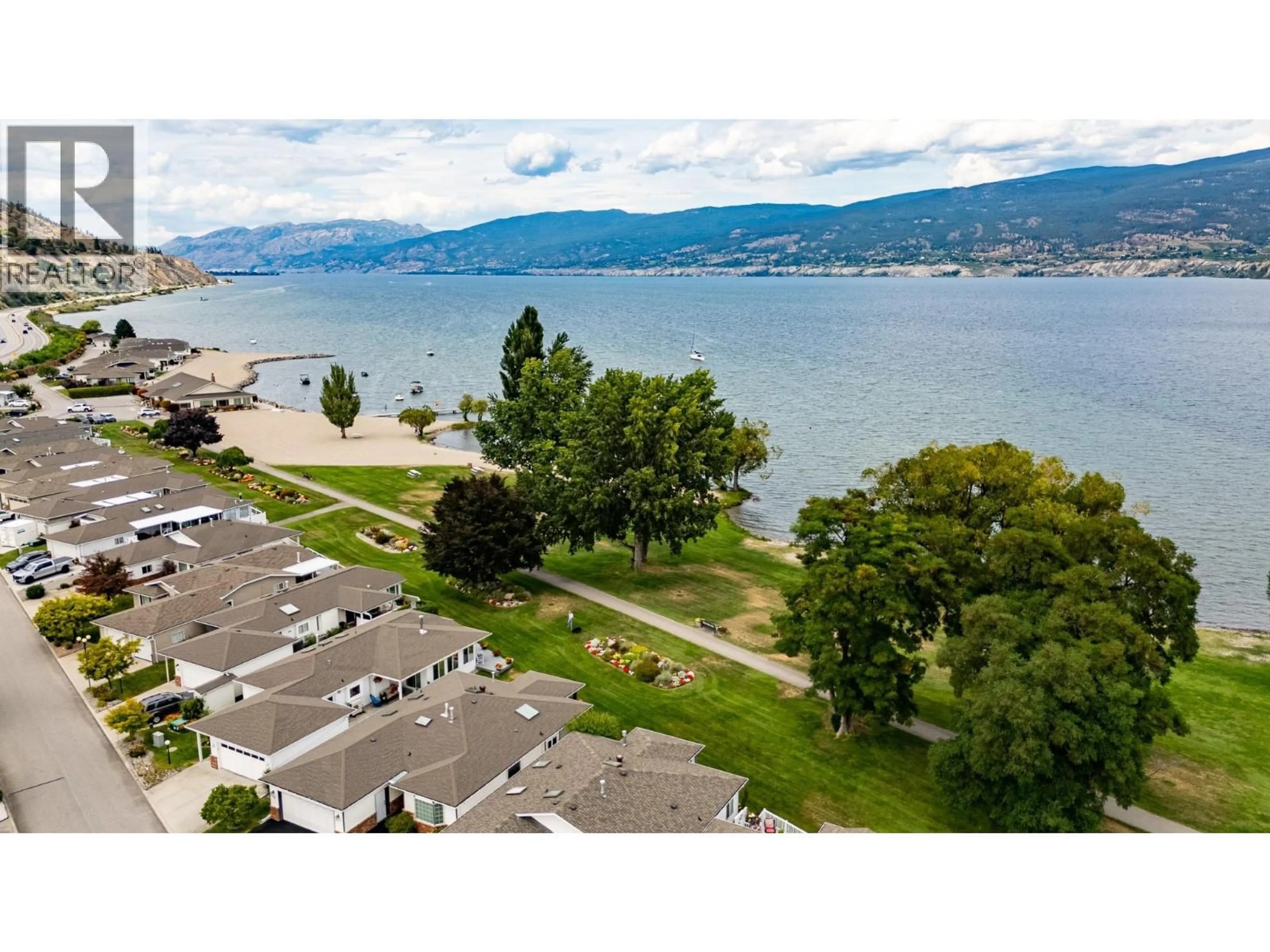 A pic from outside/outdoor area/front of a property/back of a property/a pic from drone, water/lake/river/ocean view for 57 KINGFISHER DRIVE, Penticton British Columbia V2A8K6