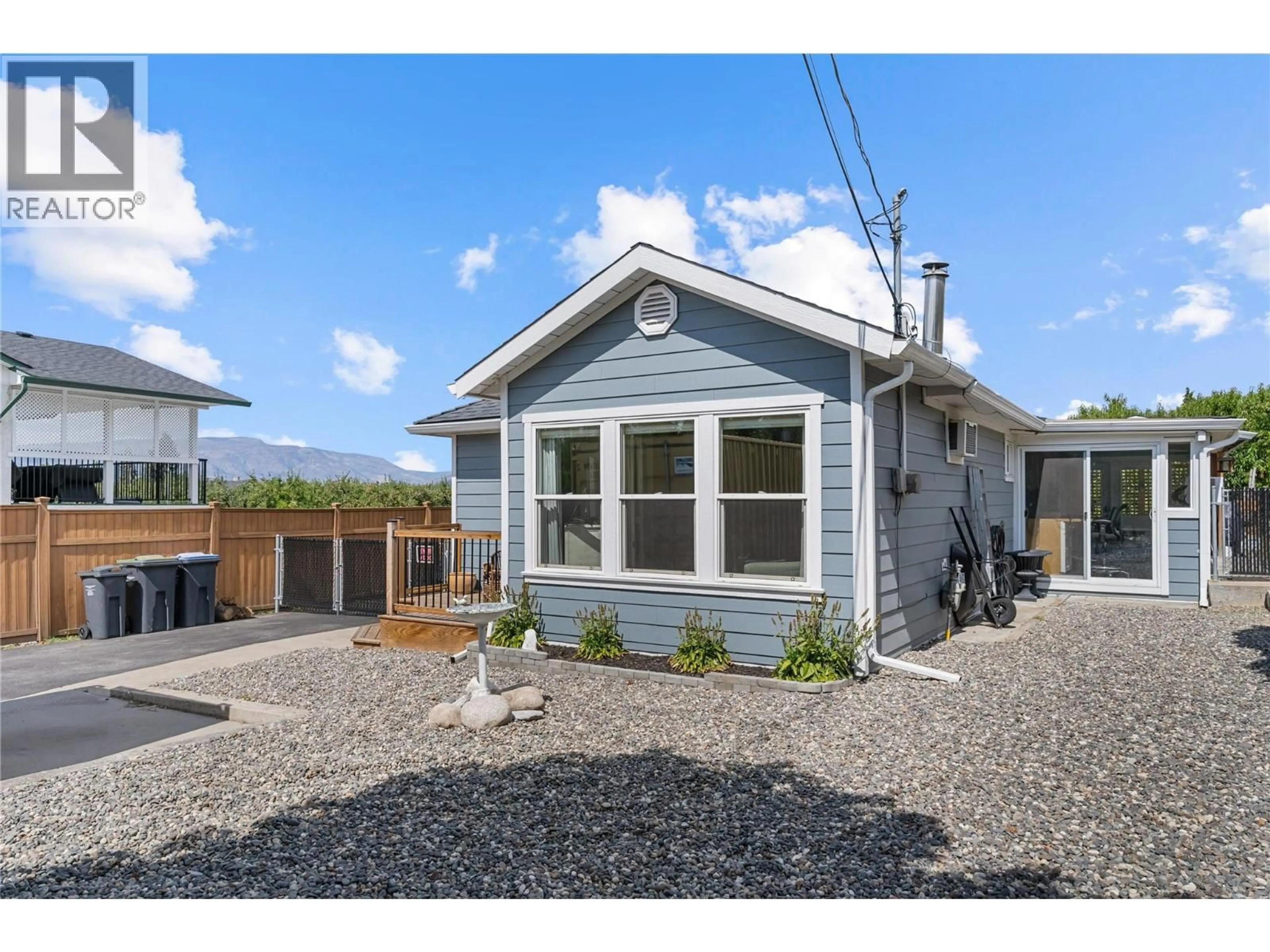 Home with vinyl exterior material, street for 2990 MCCULLOCH ROAD, Kelowna British Columbia V1W4A5