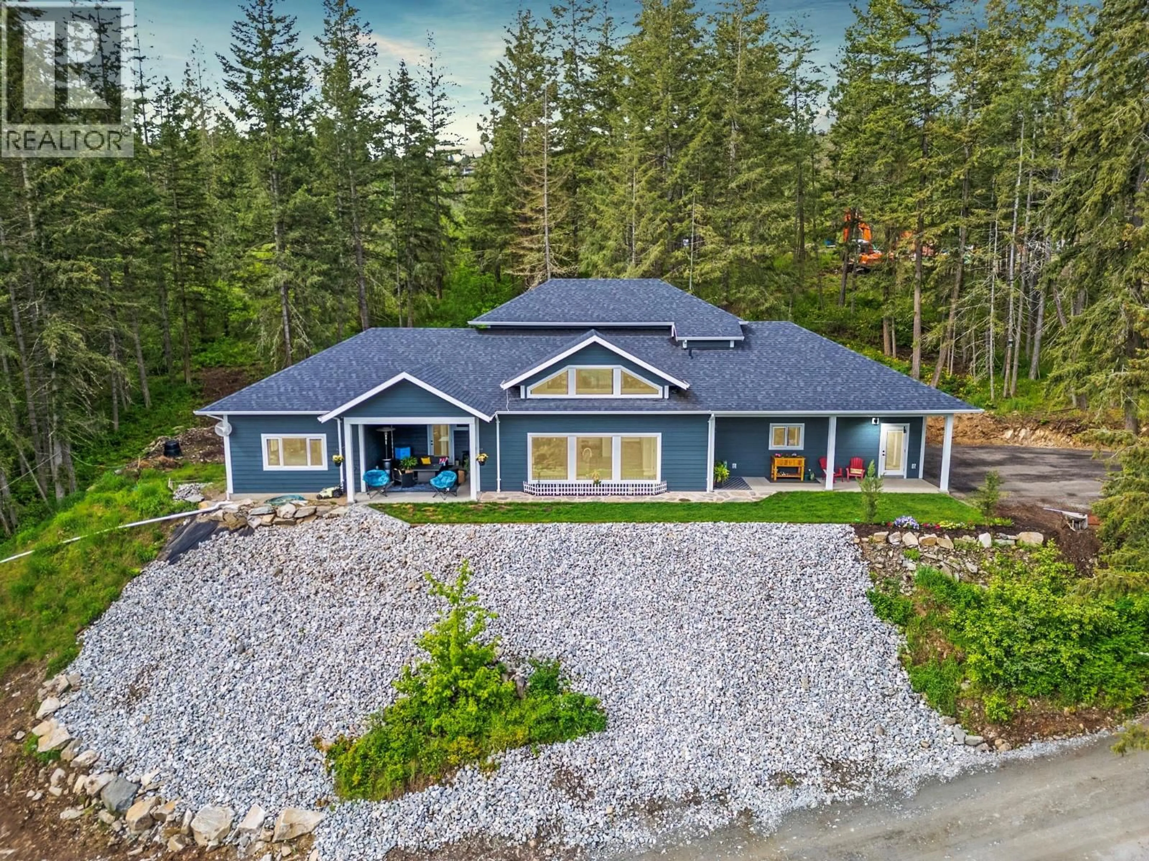 A pic from outside/outdoor area/front of a property/back of a property/a pic from drone, mountain view for 307 OXBOW PLACE, Enderby British Columbia V4Y4G2