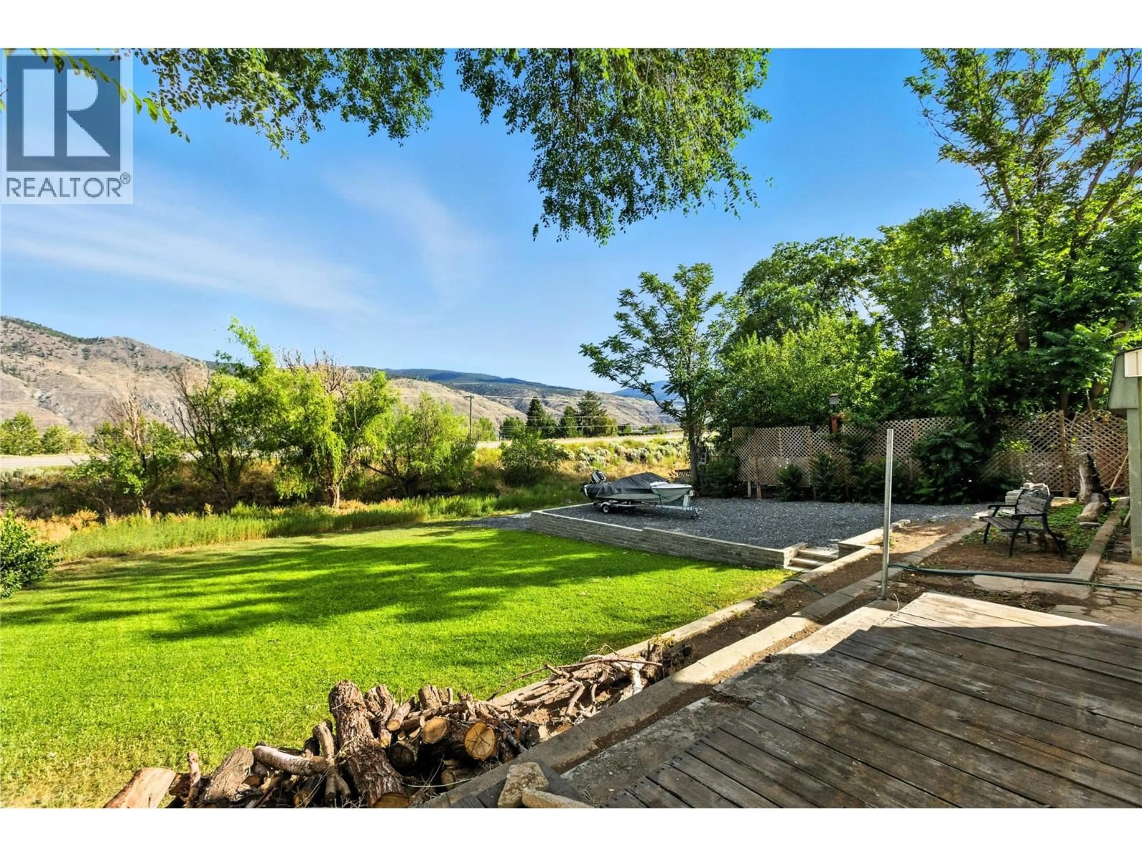 A pic from outside/outdoor area/front of a property/back of a property/a pic from drone, mountain view for 7061 WATSON  E DRIVE, Kamloops British Columbia V0K2J0
