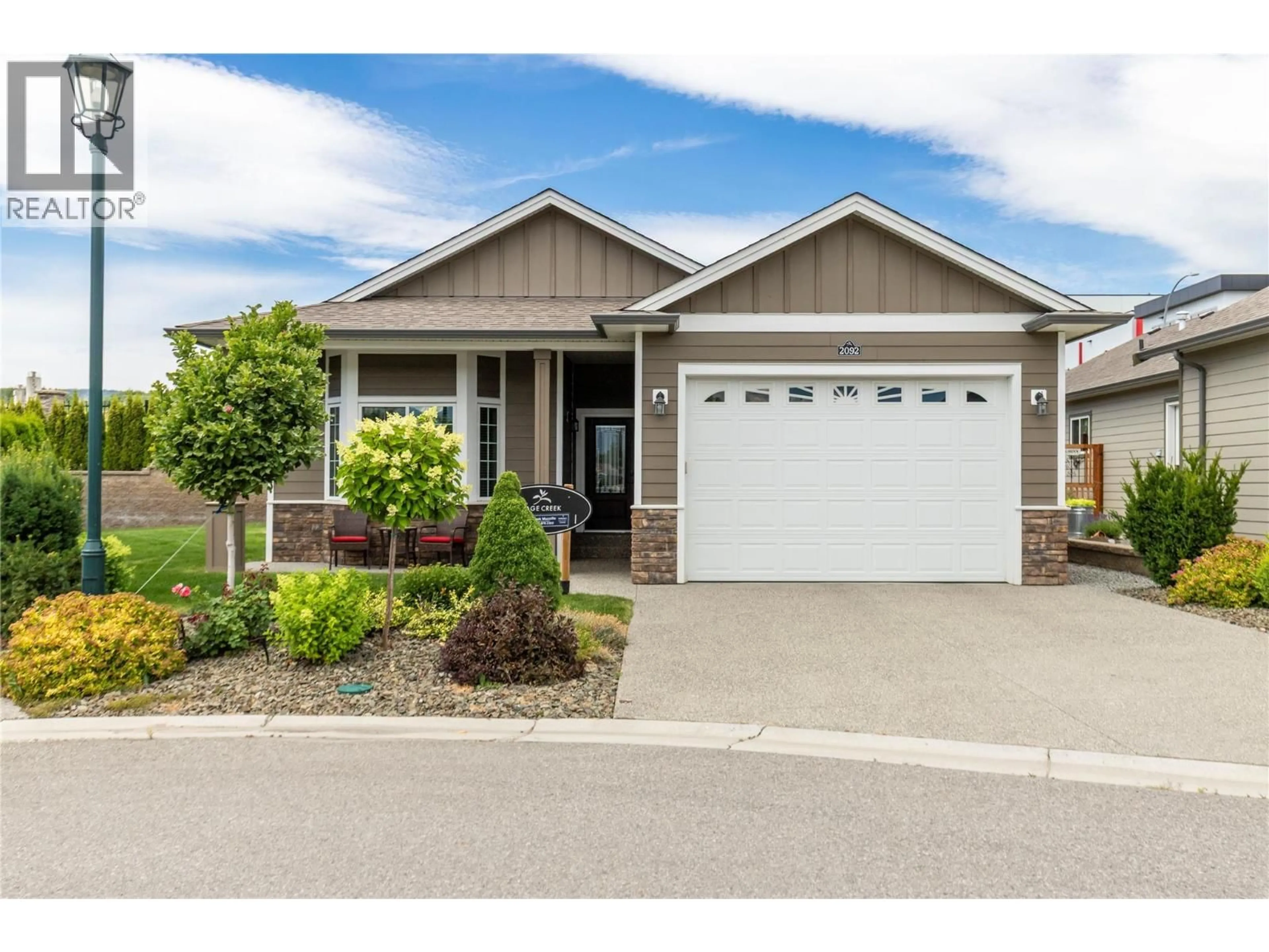 Home with vinyl exterior material, street for 2092 SAGE CRESCENT, Westbank British Columbia V4T3A5