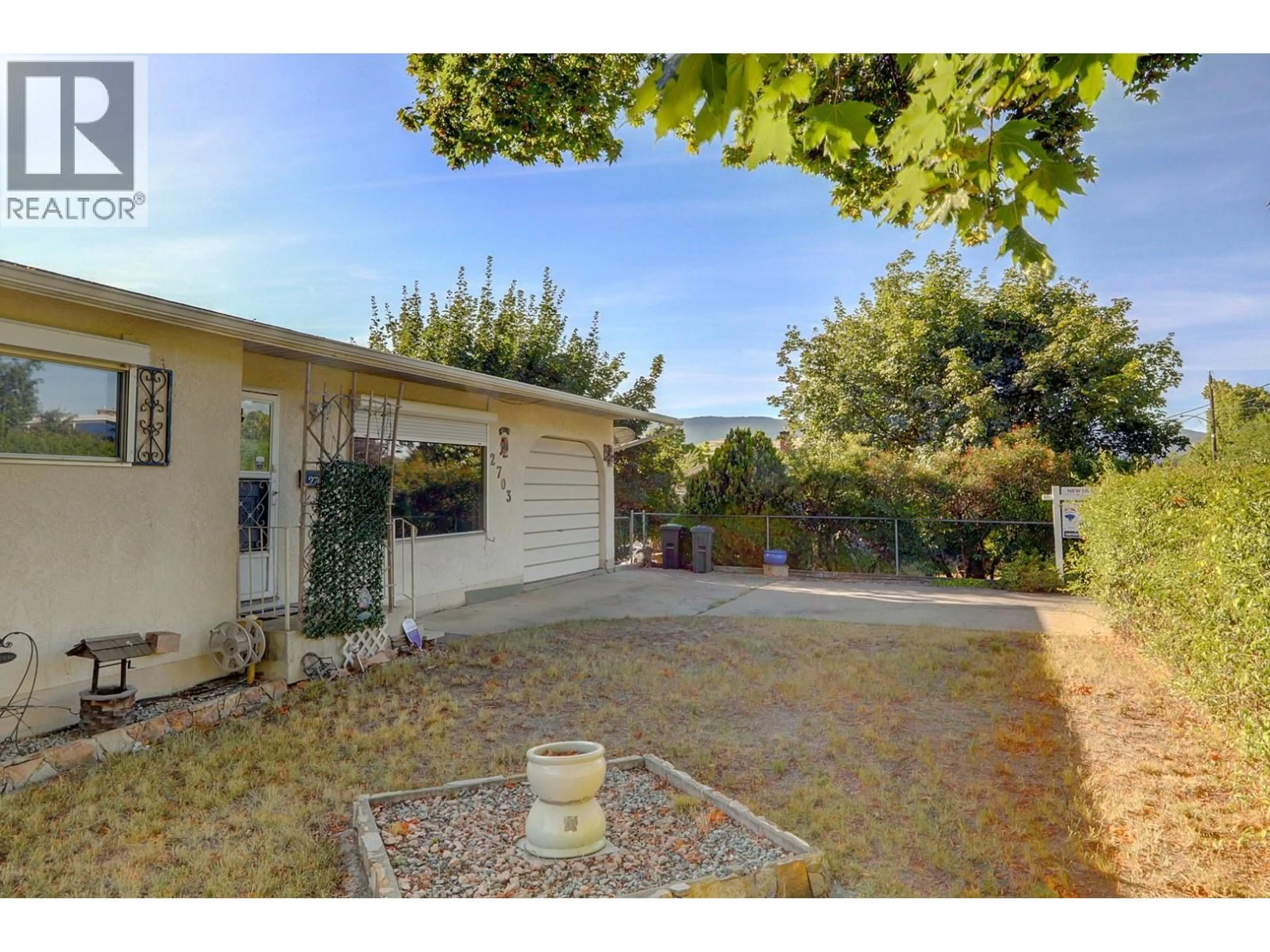 A pic from outside/outdoor area/front of a property/back of a property/a pic from drone, street for 2703 18 STREET, Vernon British Columbia V1T8V8