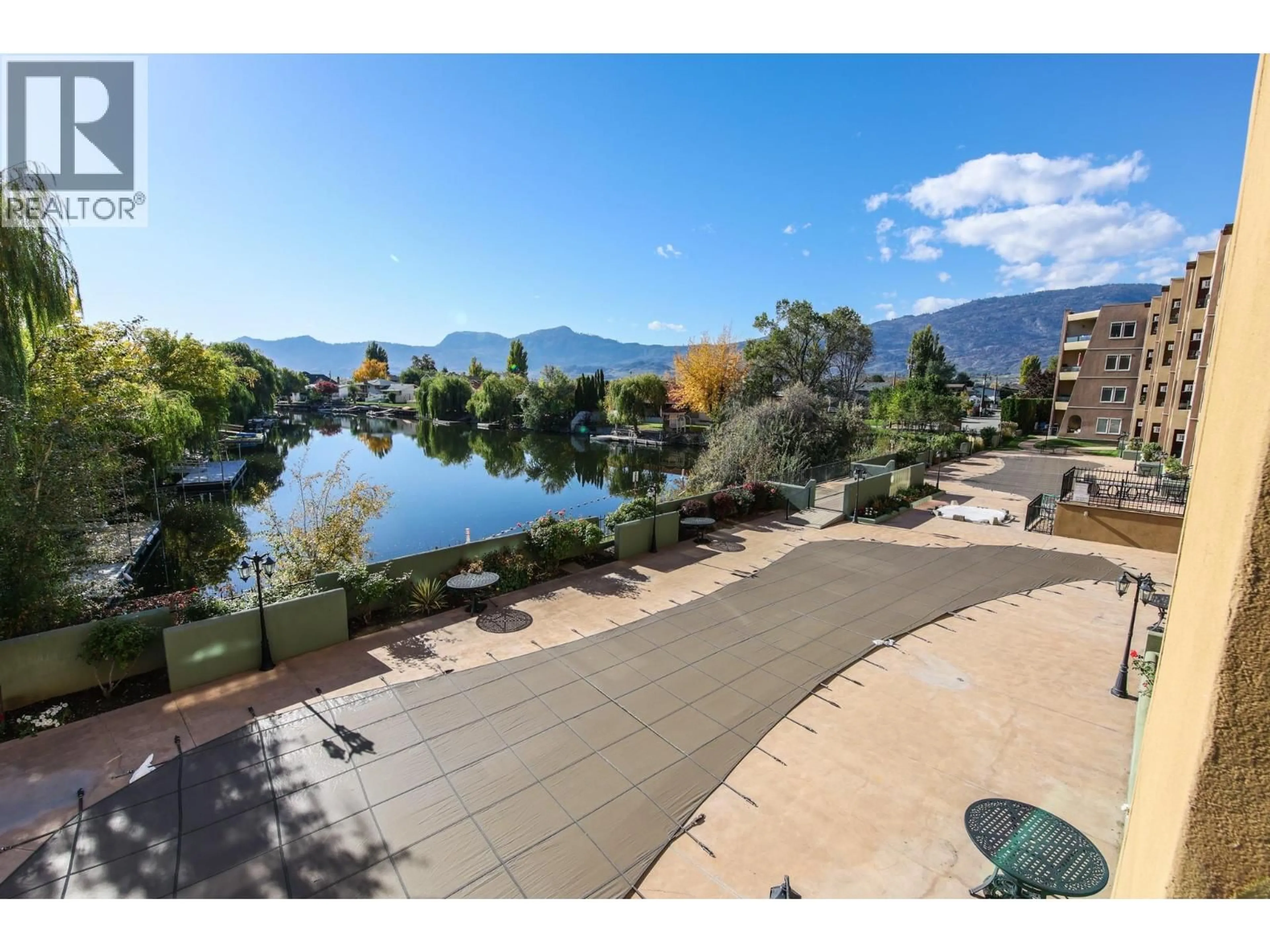 A pic from outside/outdoor area/front of a property/back of a property/a pic from drone, water/lake/river/ocean view for 204 - 15 SOLANA KEY COURT, Osoyoos British Columbia V0H1V3