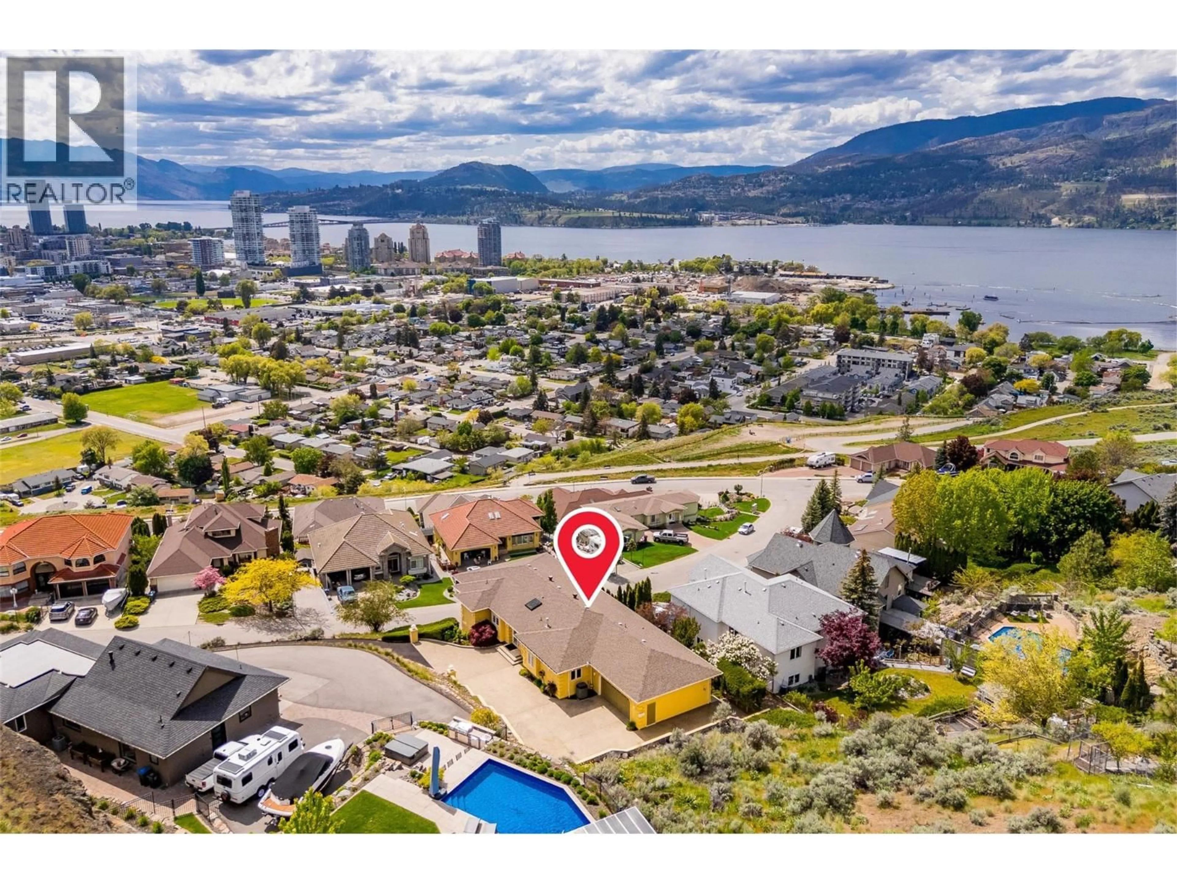 A pic from outside/outdoor area/front of a property/back of a property/a pic from drone, water/lake/river/ocean view for 647 ROYAL PINE DRIVE, Kelowna British Columbia V1Y9K5