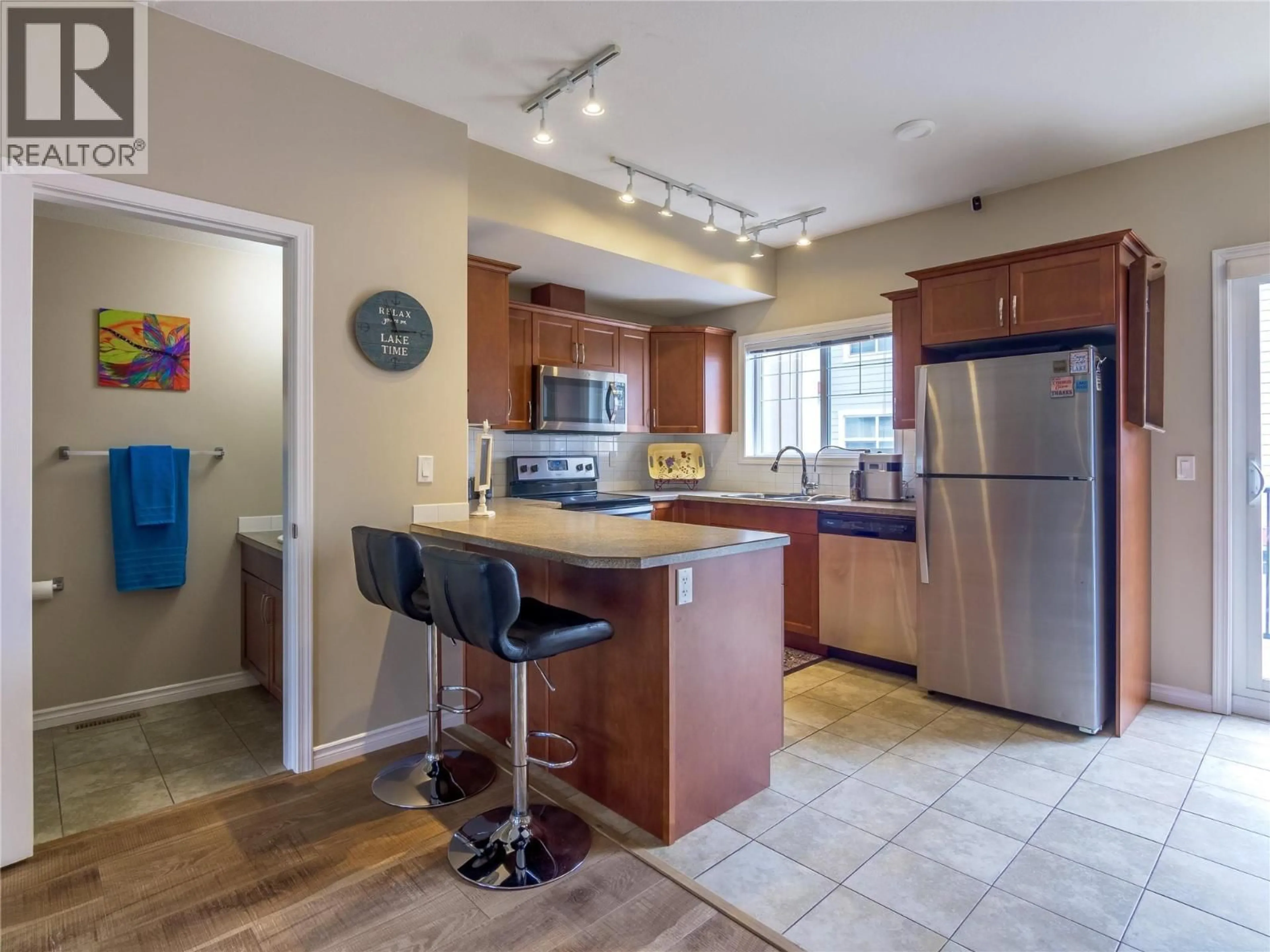 Open concept kitchen, ceramic/tile floor for 105 - 3363 WILSON STREET, Penticton British Columbia V2A9G7