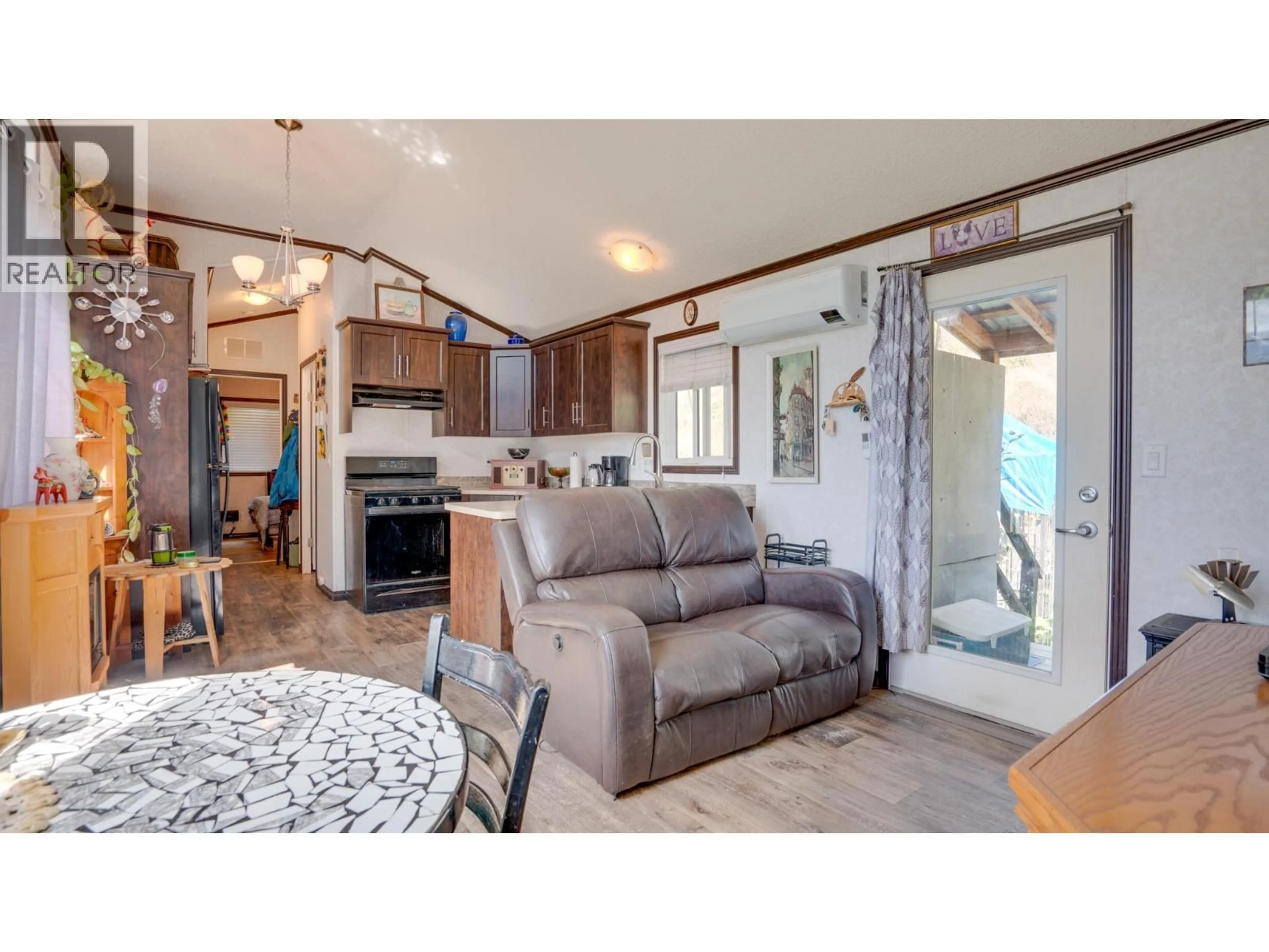 Open concept kitchen, wood/laminate floor for 4050 WHITE LAKE ROAD, Tappen British Columbia V0E2W0