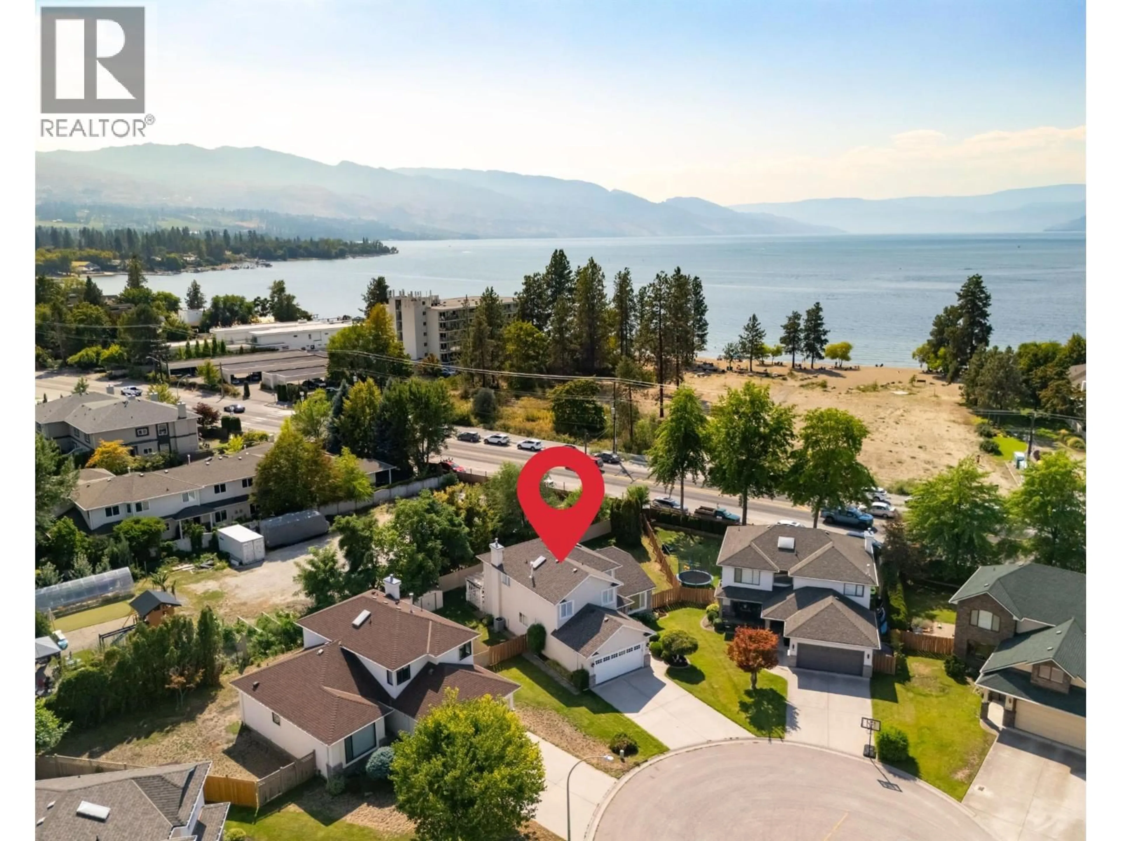 A pic from outside/outdoor area/front of a property/back of a property/a pic from drone, water/lake/river/ocean view for 4018 LOGIE COURT, Kelowna British Columbia V1W3Y6
