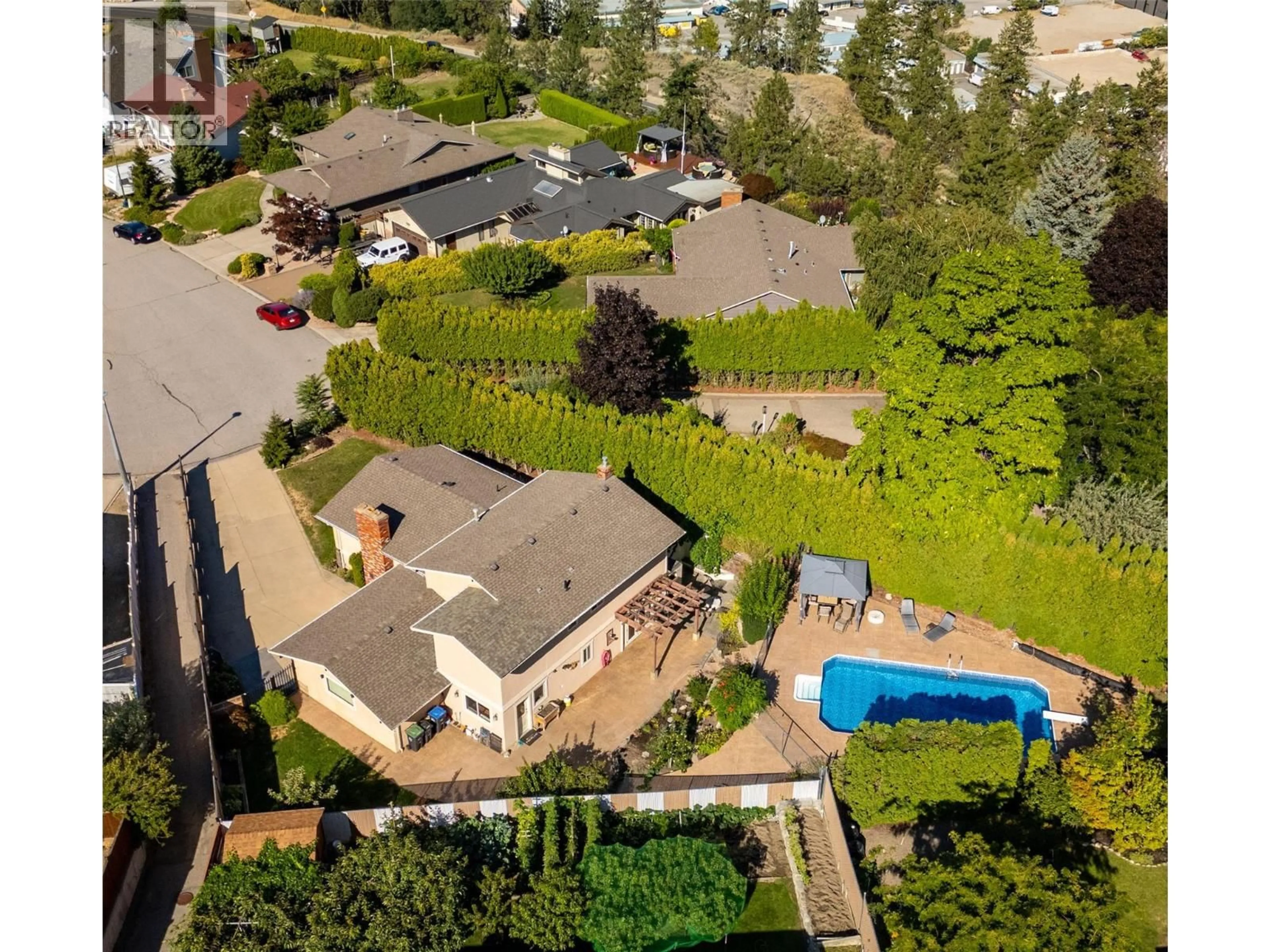 A pic from outside/outdoor area/front of a property/back of a property/a pic from drone, street for 144 WILTSE PLACE, Penticton British Columbia V2A7V6