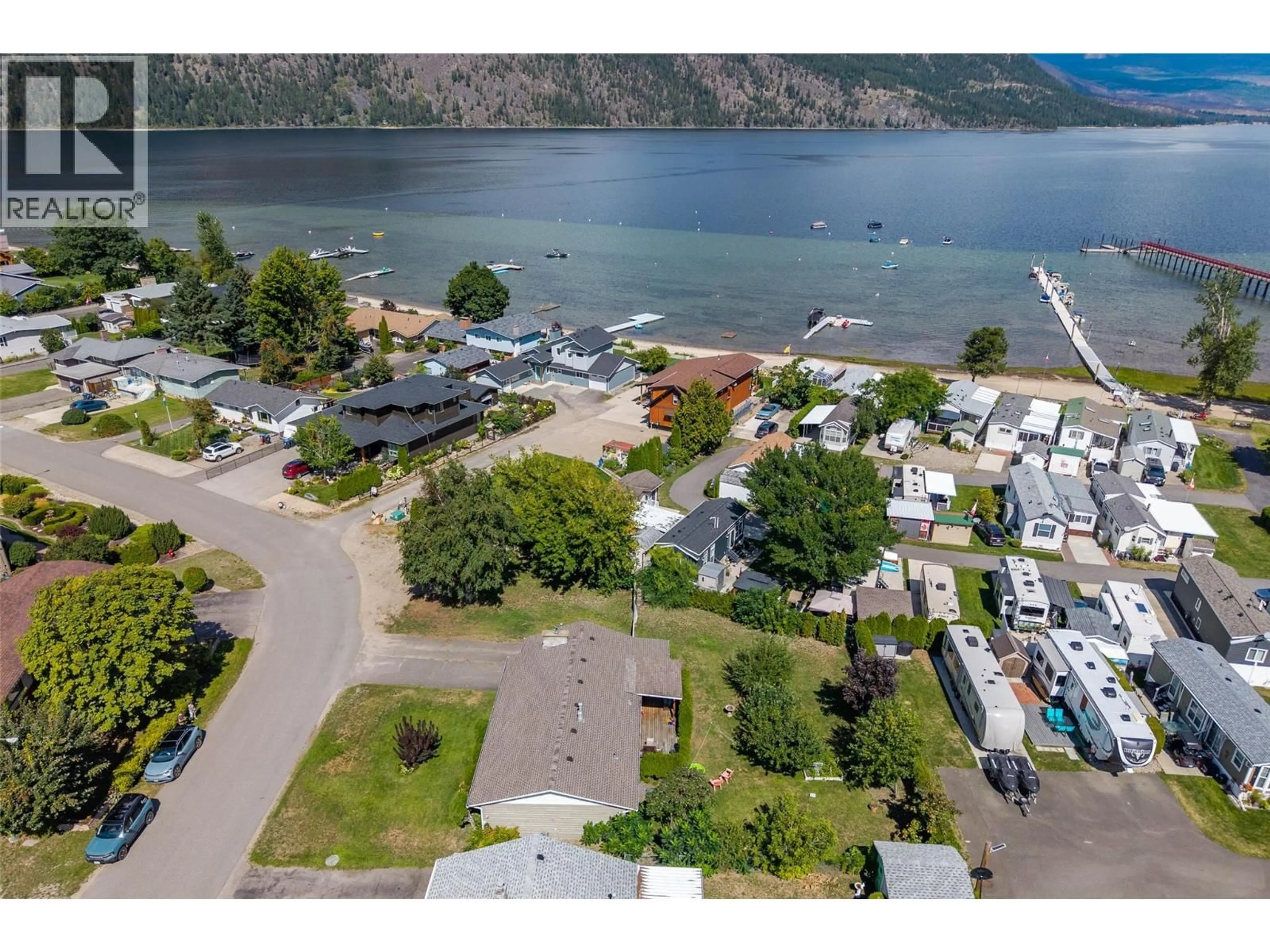 A pic from outside/outdoor area/front of a property/back of a property/a pic from drone, water/lake/river/ocean view for 229 LAKESHORE DRIVE, Chase British Columbia V0E1M0