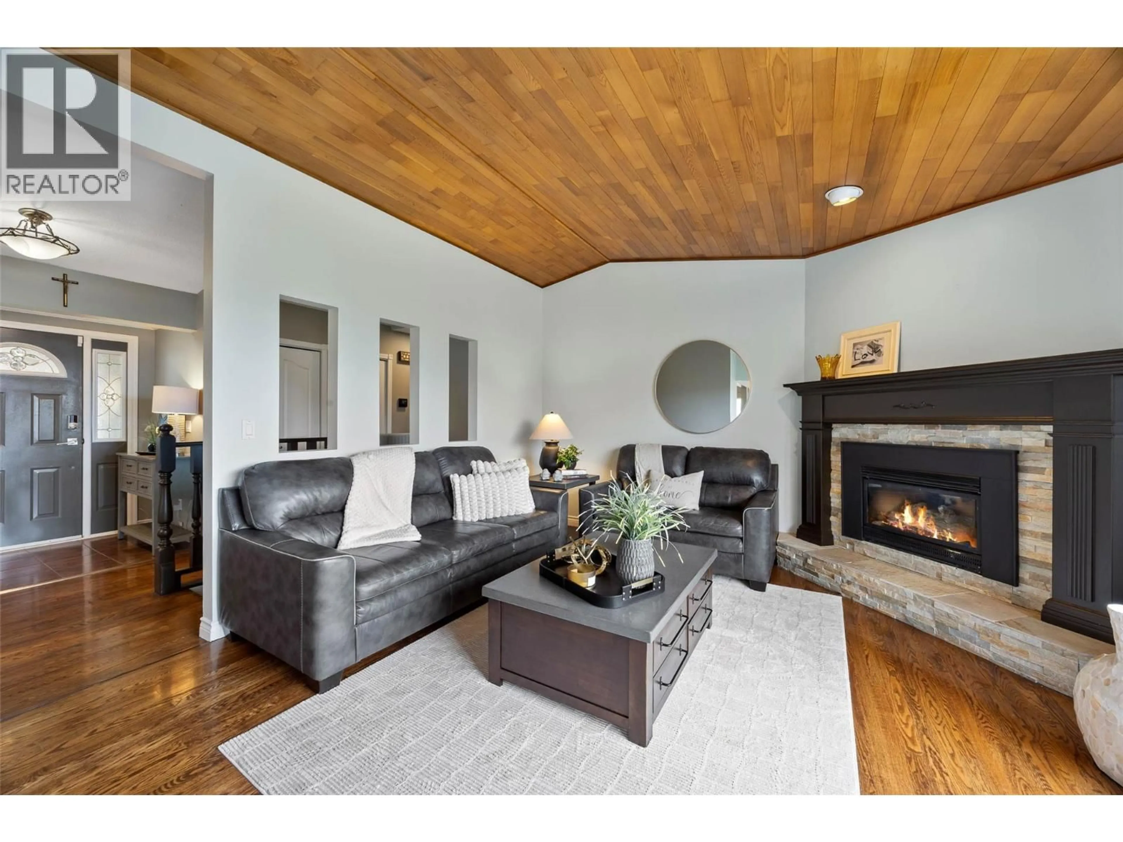 Living room with furniture, wood/laminate floor for 770 SEQUOIA PLACE, Kamloops British Columbia V2C5W2