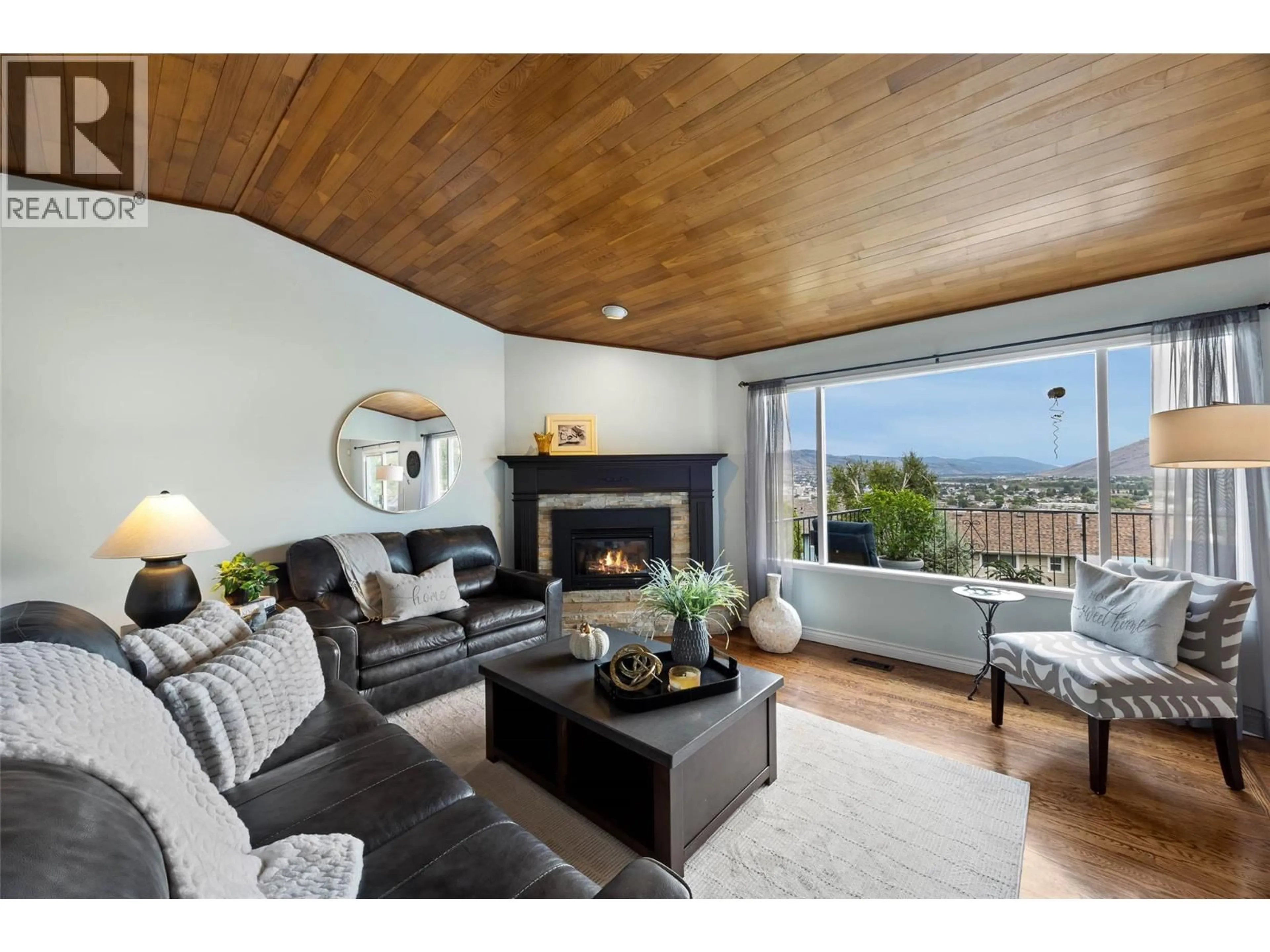 Living room with furniture, wood/laminate floor for 770 SEQUOIA PLACE, Kamloops British Columbia V2C5W2