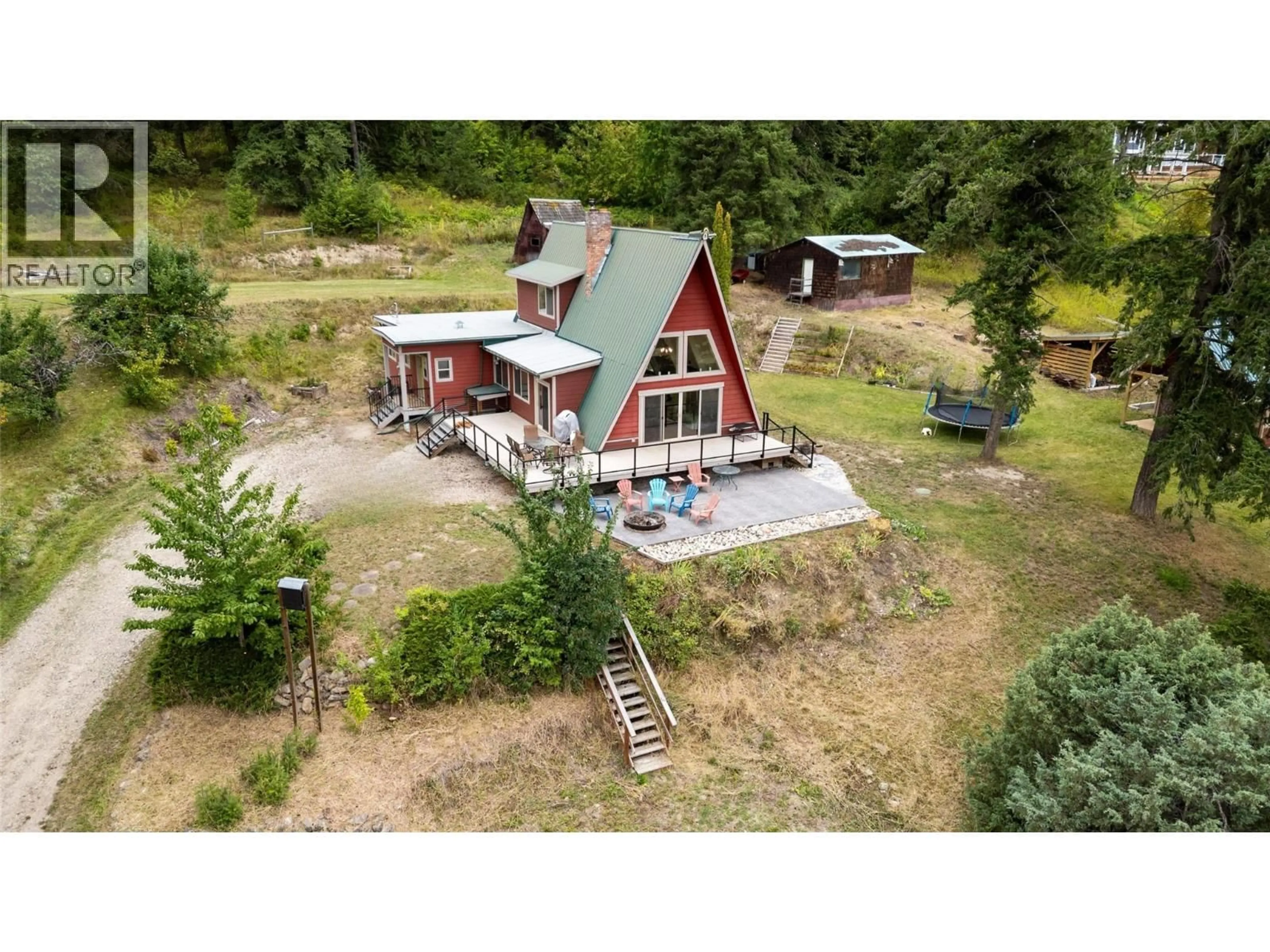 A pic from outside/outdoor area/front of a property/back of a property/a pic from drone, building for 6551 40 STREET, Salmon Arm British Columbia V1E3A5