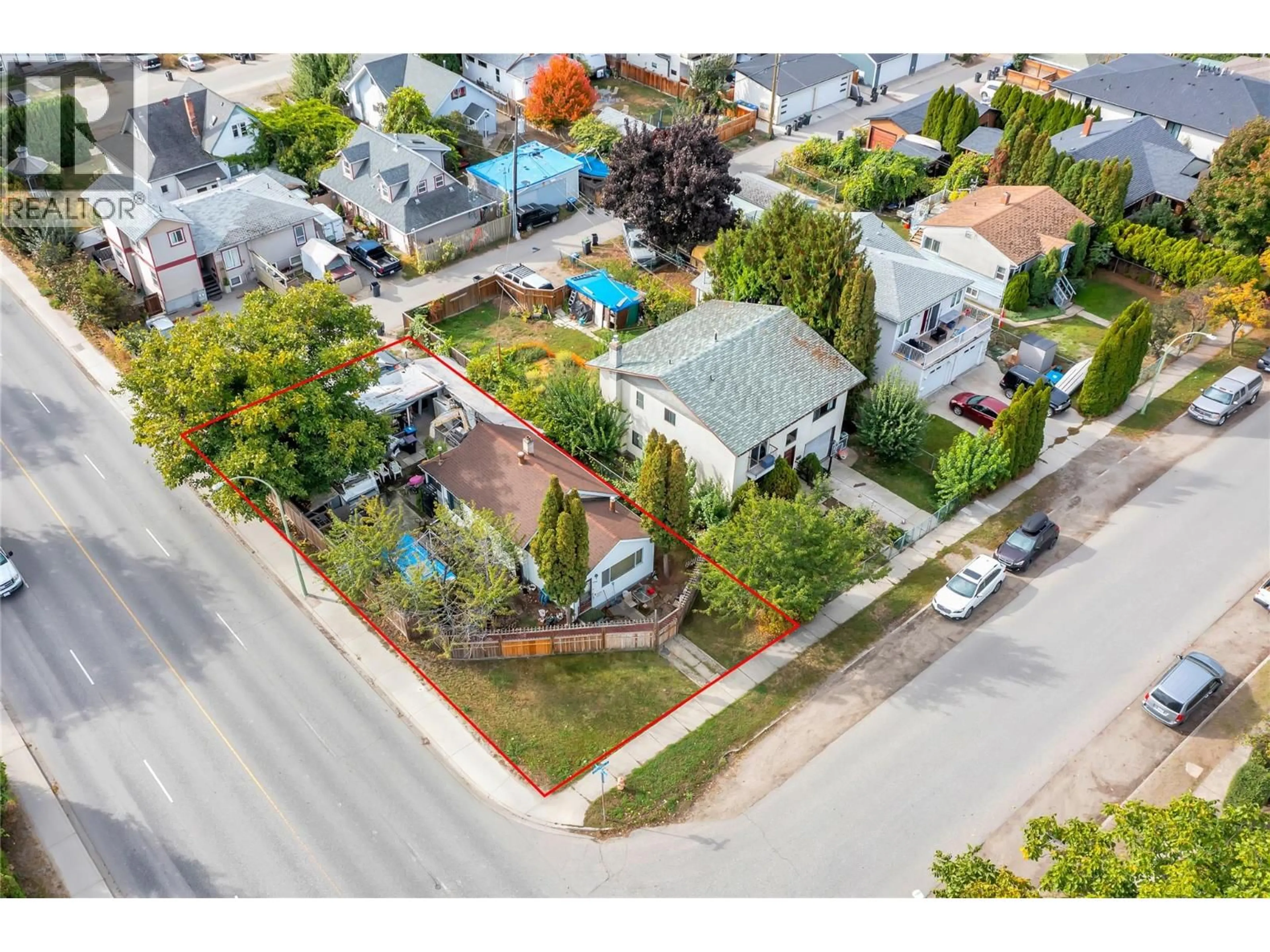 A pic from outside/outdoor area/front of a property/back of a property/a pic from drone, street for 1099 STOCKWELL AVENUE, Kelowna British Columbia V1Y6W4