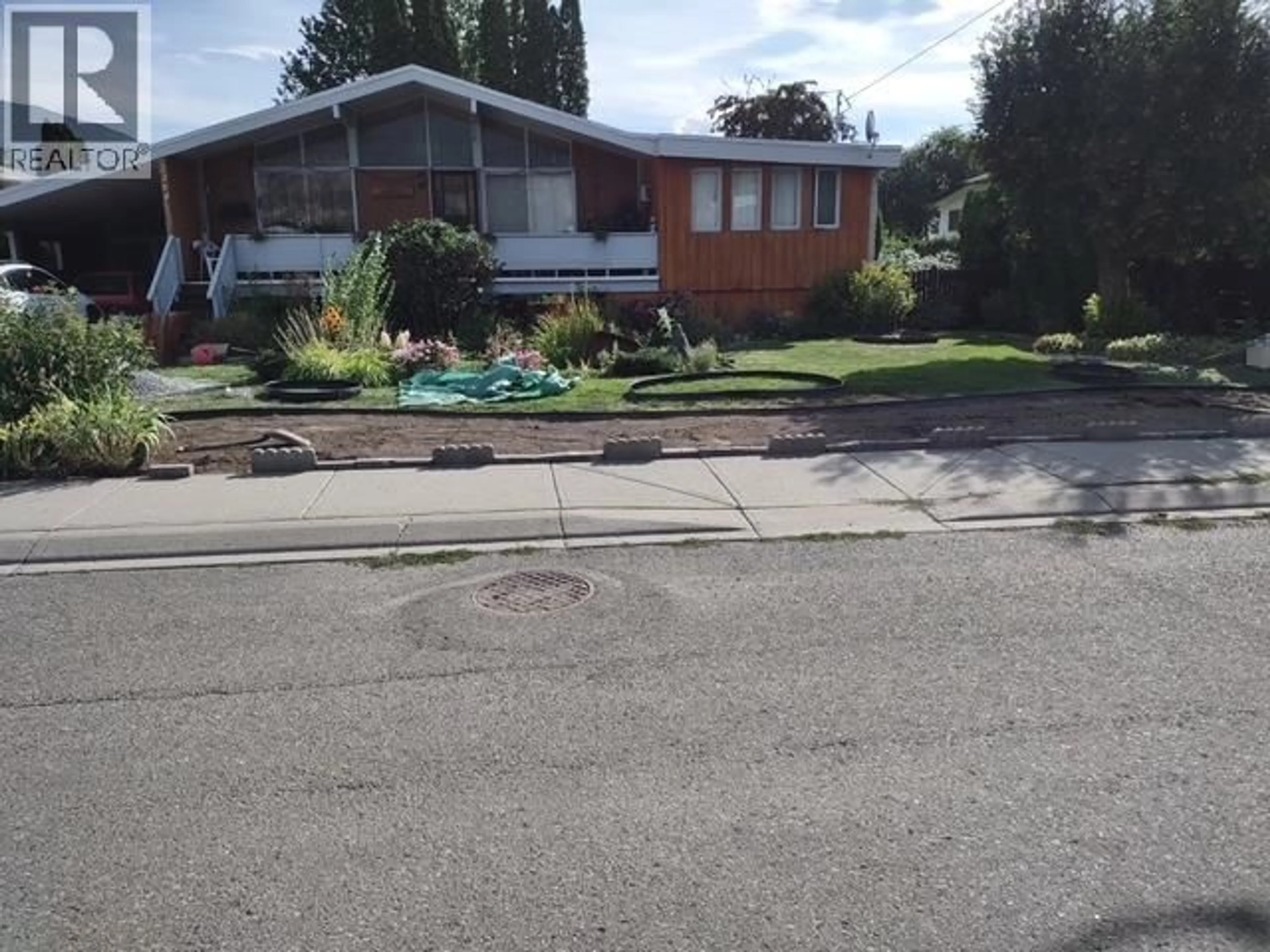 A pic from outside/outdoor area/front of a property/back of a property/a pic from drone, street for 2264 MERRITT AVENUE, Merritt British Columbia V1K1B8