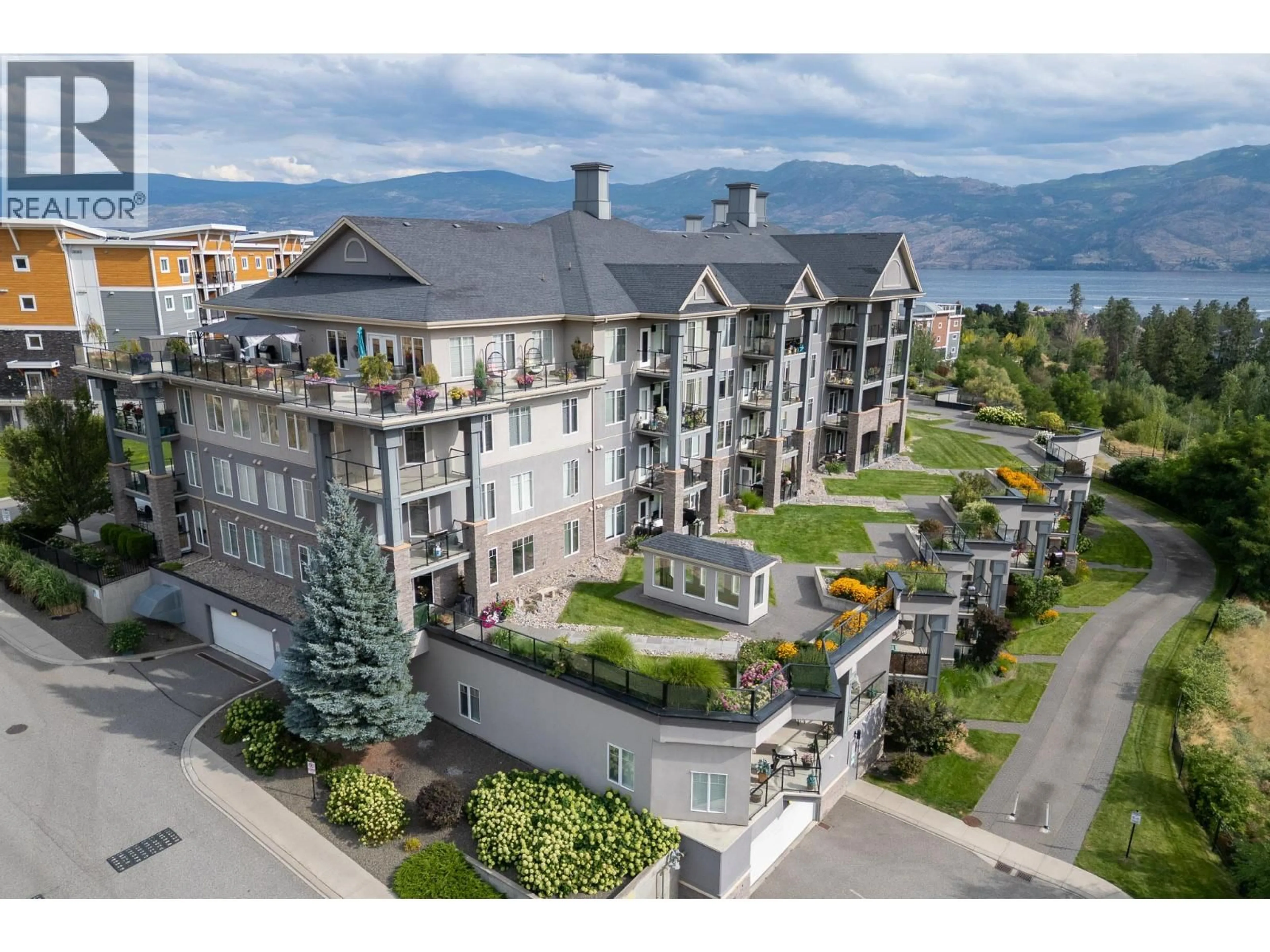 A pic from outside/outdoor area/front of a property/back of a property/a pic from drone, mountain view for 501 - 3645 CARRINGTON ROAD, West Kelowna British Columbia V4T3G9