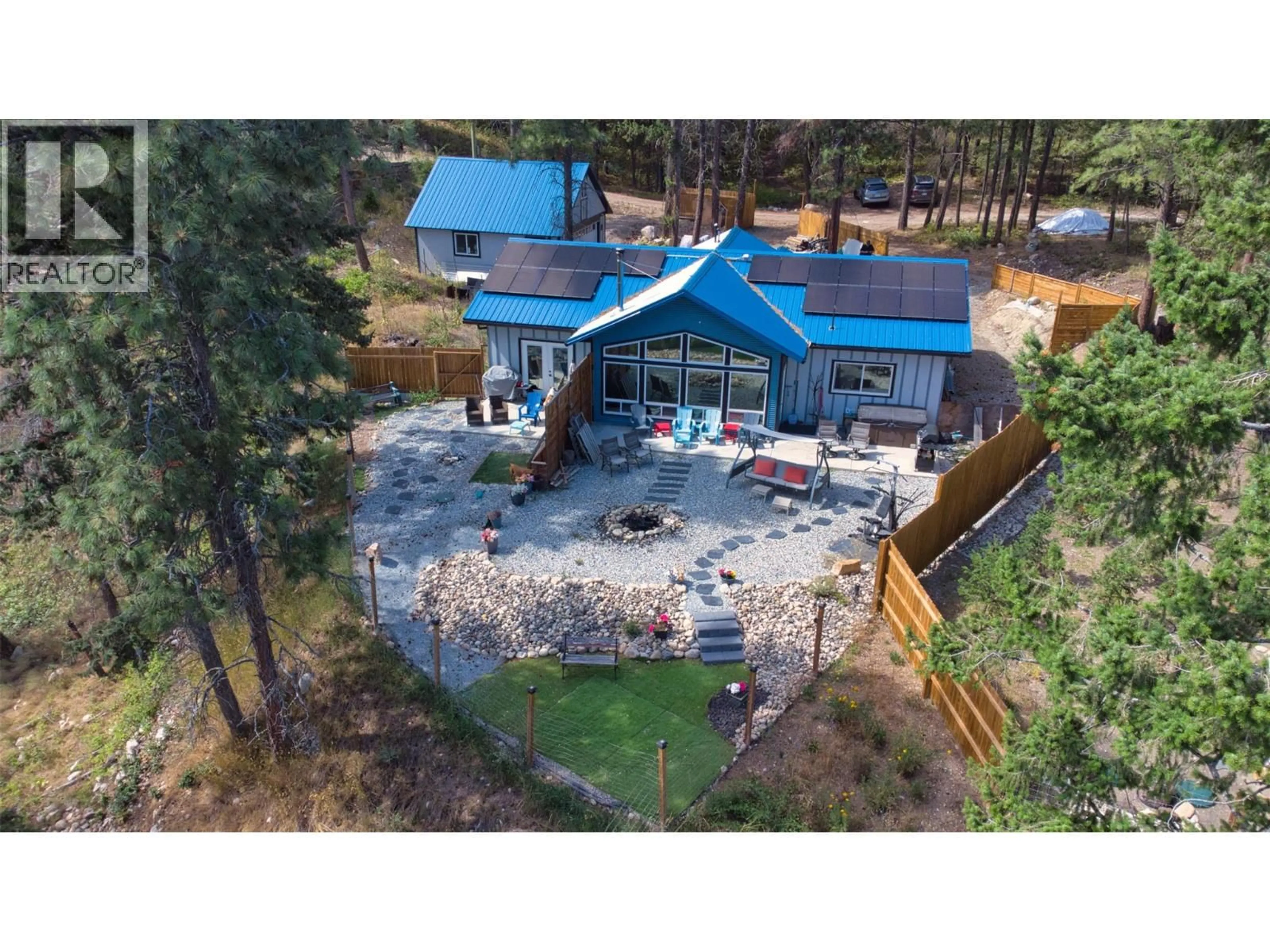 A pic from outside/outdoor area/front of a property/back of a property/a pic from drone, mountain view for 10795 WESTSHORE ROAD, Vernon British Columbia V1H2C3