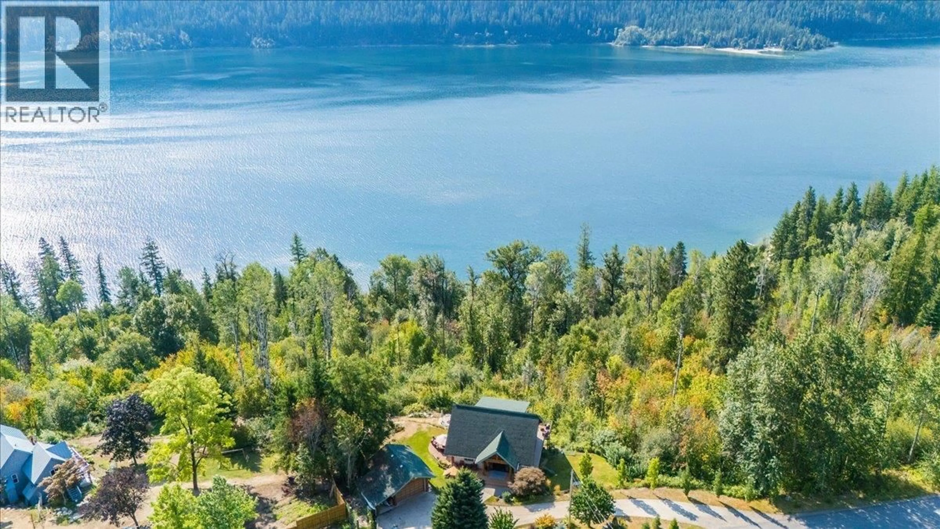 A pic from outside/outdoor area/front of a property/back of a property/a pic from drone, water/lake/river/ocean view for 3135 KENIRIS ROAD, Nelson British Columbia V1L6Z8