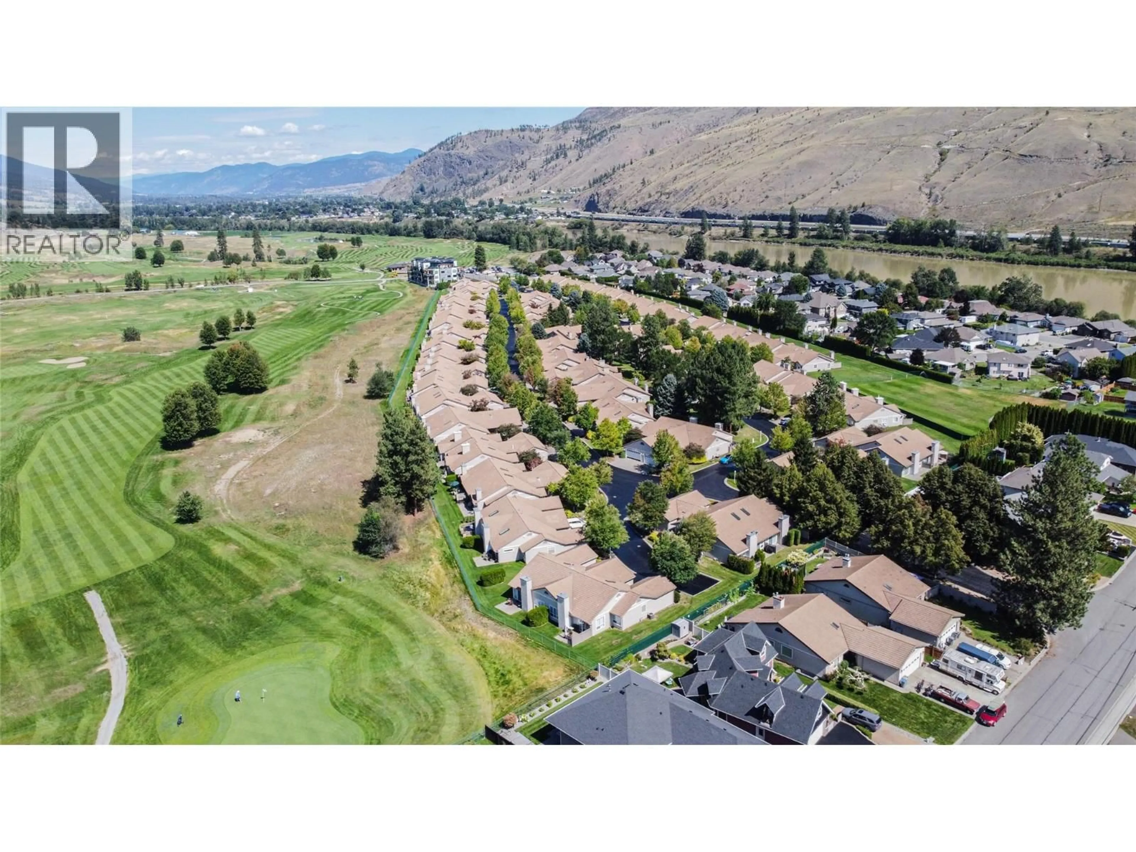 A pic from outside/outdoor area/front of a property/back of a property/a pic from drone, mountain view for 102 - 650 HARRINGTON ROAD, Kamloops British Columbia V2B6T7