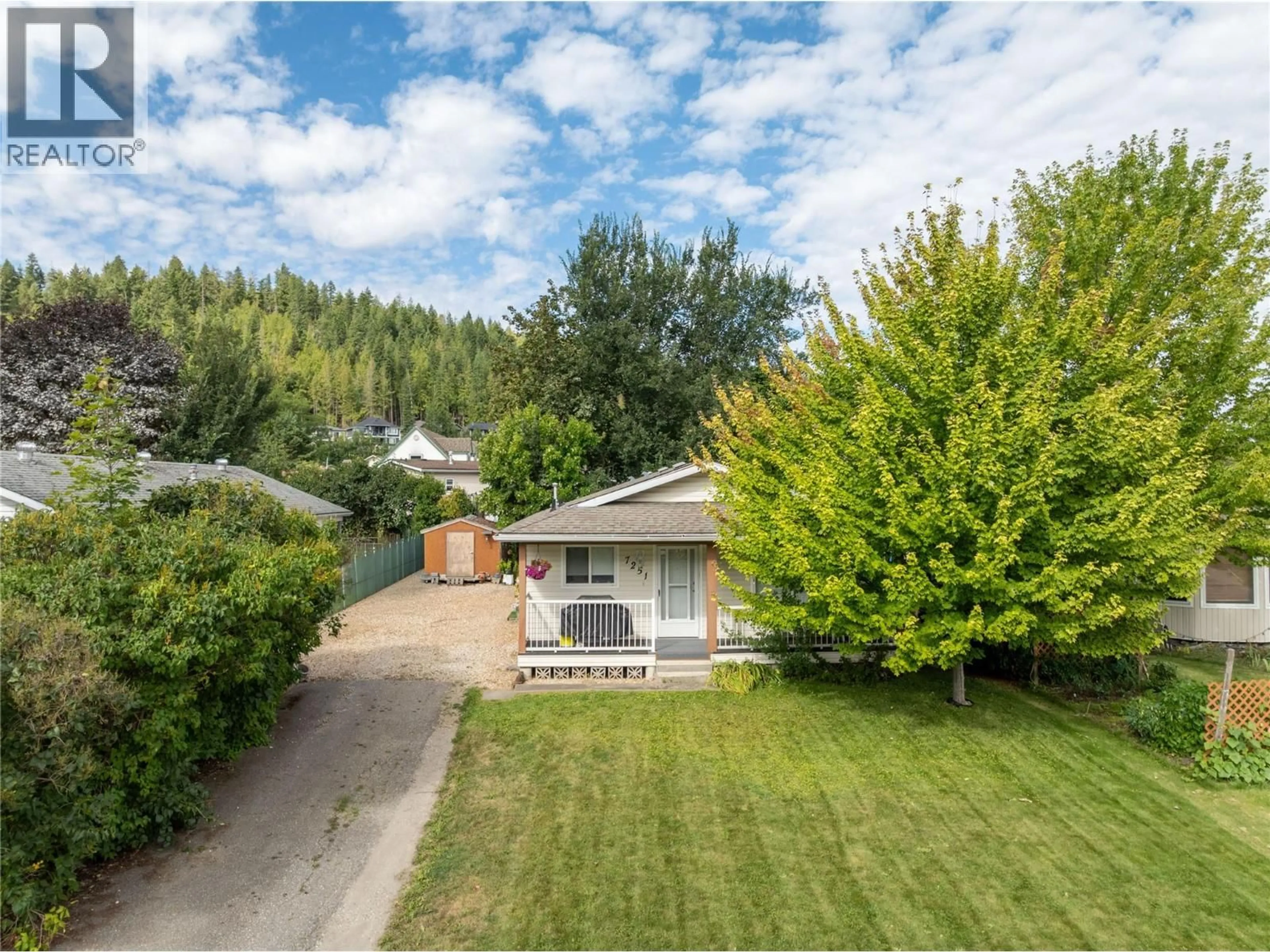 A pic from outside/outdoor area/front of a property/back of a property/a pic from drone, street for 7251 48 STREET NORTHEAST, Salmon Arm British Columbia V0E1K0